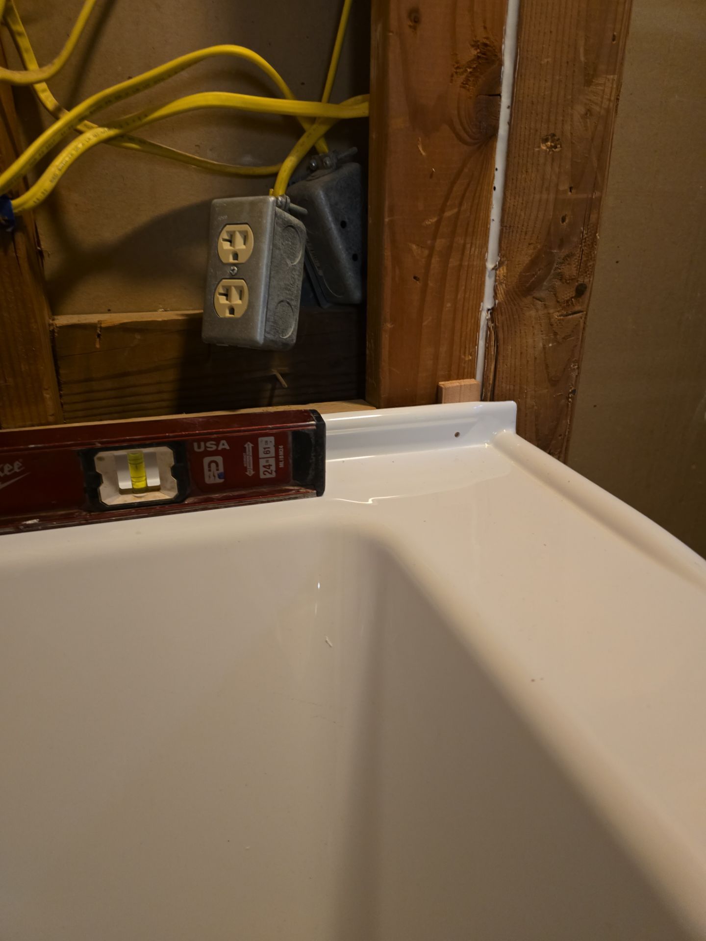 Shower Tub Installation with Underground Plumbing by Us Plumbing 