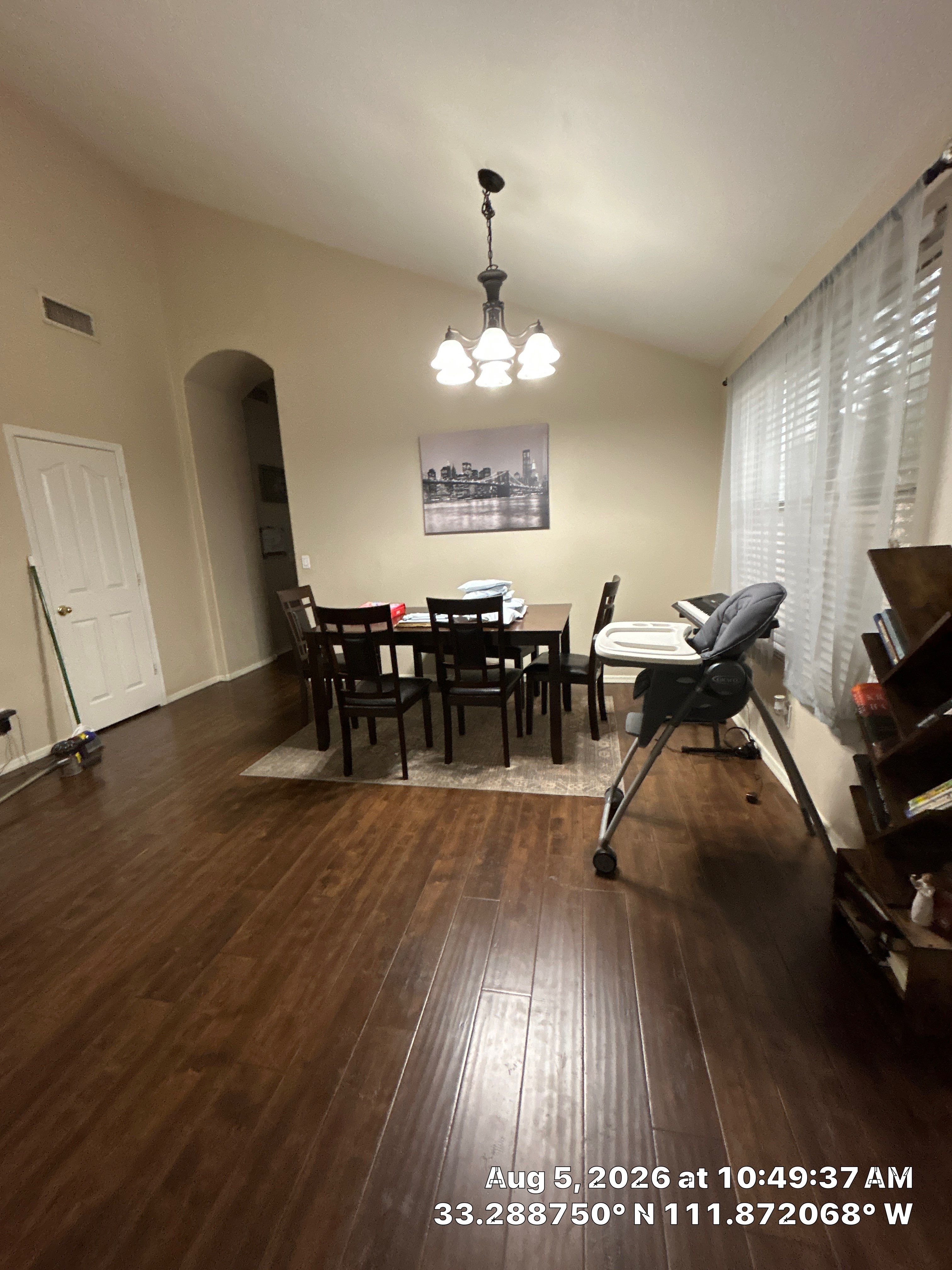 Chandler Dining Room Renovation Featuring New Lighting and Wood-Look Flooring by CompanyCam Sales Demo