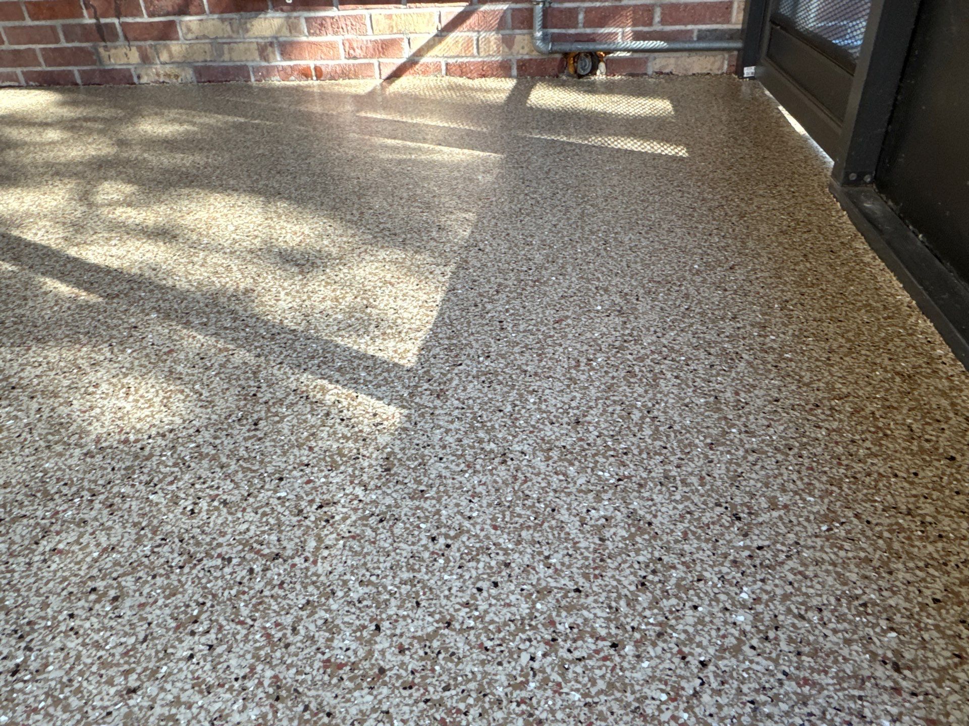 Porch in Gainesville, FL in Pecan by Cross Creek Concrete Coatings