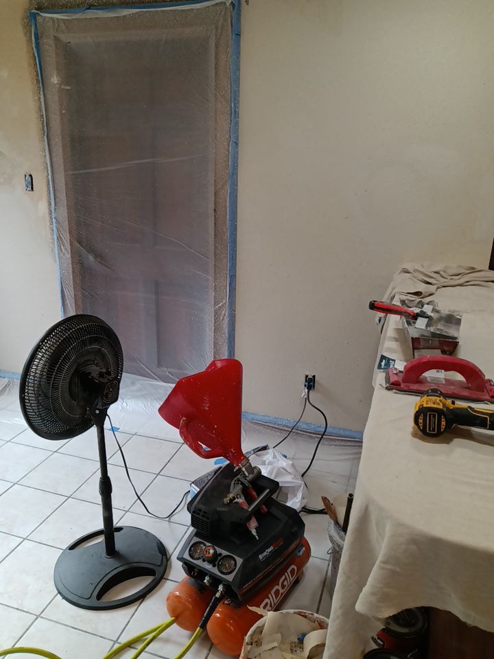 Interior and exterior painting project by Roof Concepts Construction