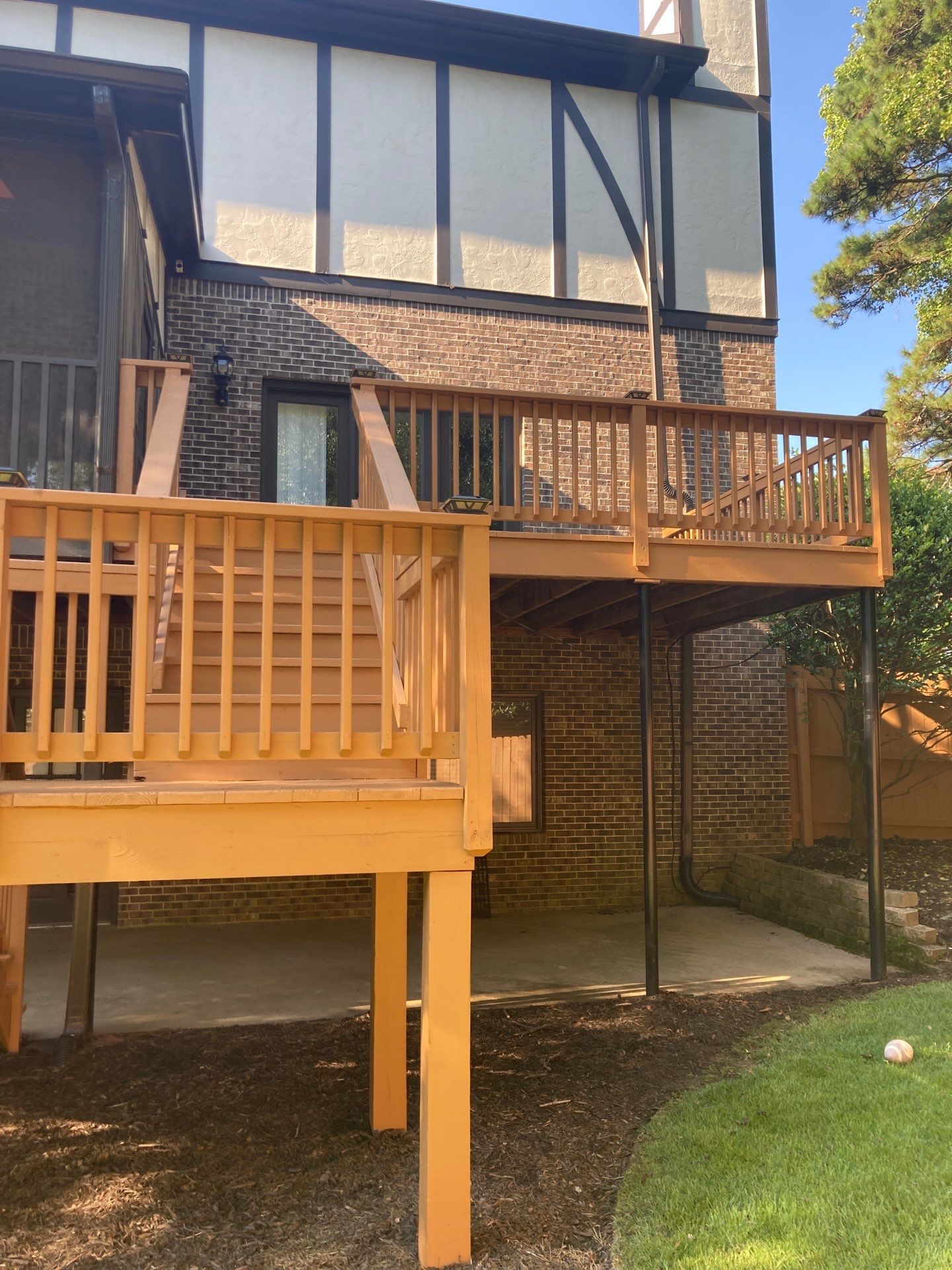Deck and Fence Stain with Deck Board Repairs in Atlanta, GA by Nelson Exteriors 