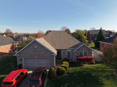 Owens Corning Duration - Sand Castle W/White Gutters