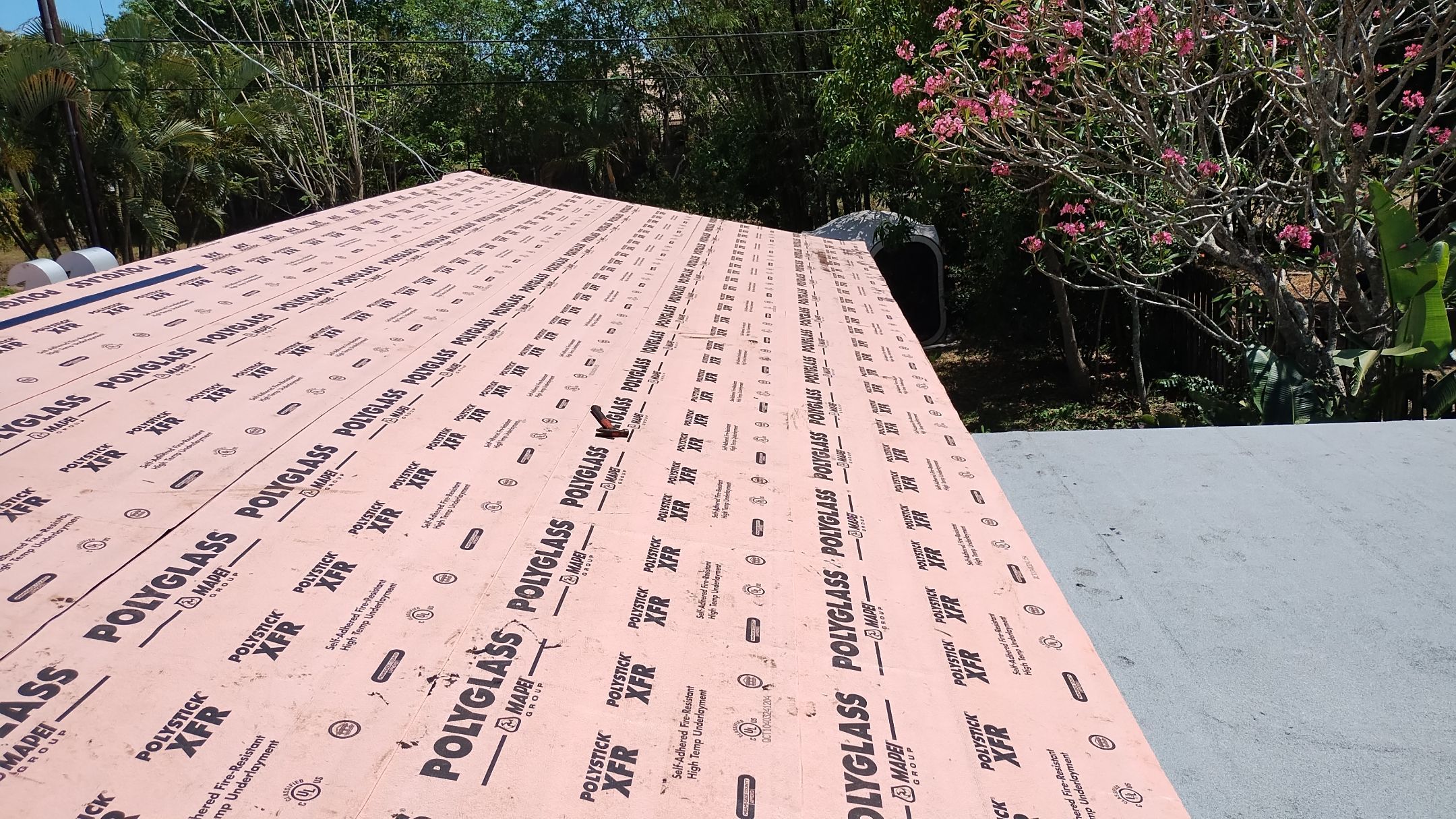 Residential Roofing Installation using 1" Nail strip metal roof by BLUES BROTHERS ROOFING