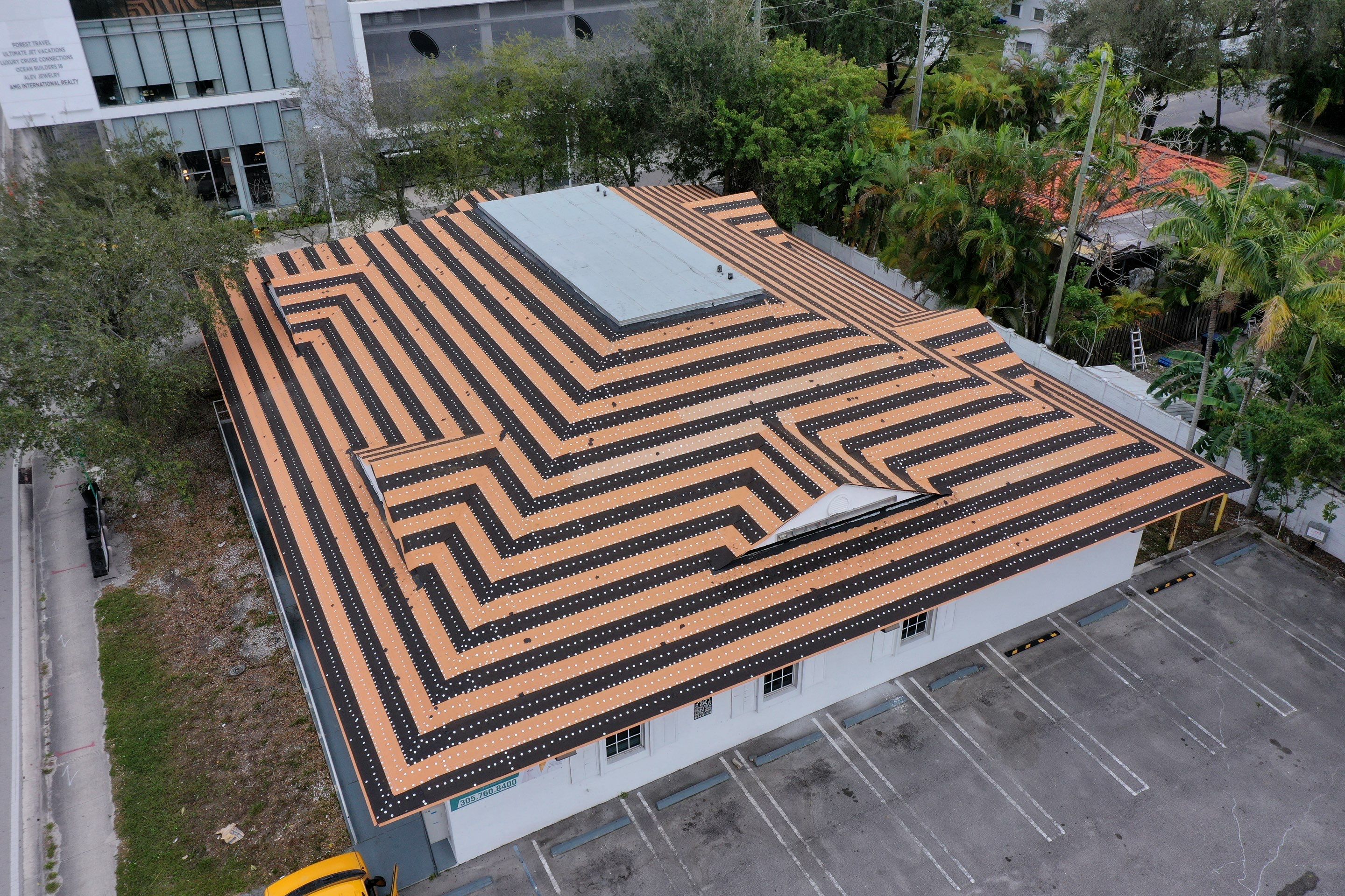 COMMERCIAL REROOF 24 GUAGE MEDIUM BRONZE 1-1/2" MECHANICAL SEAM "ZEBRA METHOD" by Earl W. Johnston Roofing LLC