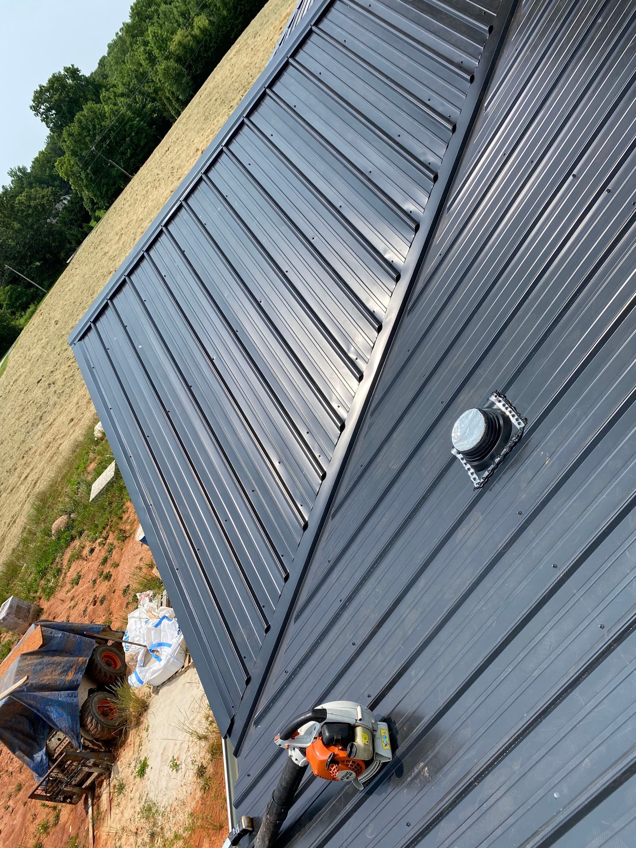 Jason's metal porch roof by BROCK BUILDERS 