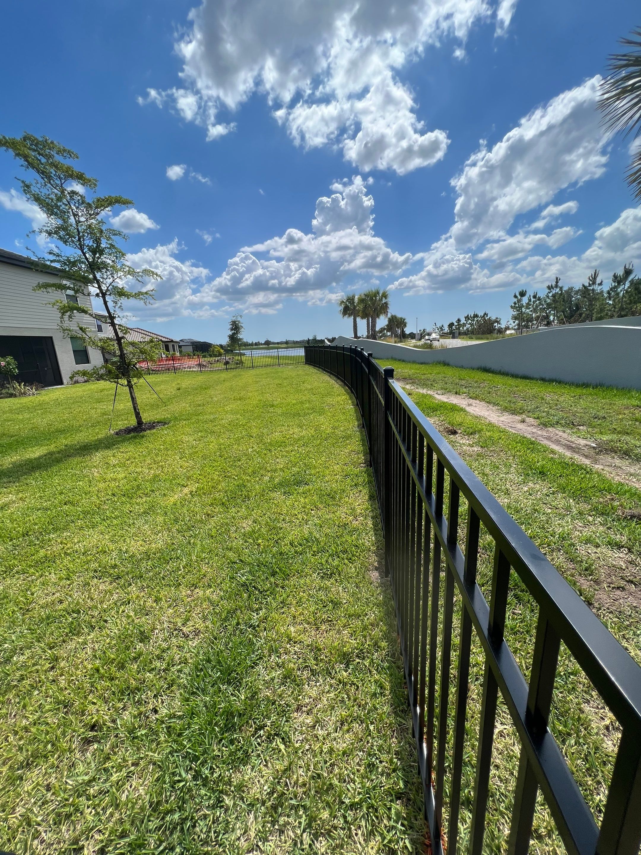 Aluminum Fence Installation using Black 3 Rail Aluminum Fence by Asap fence and gates, LLC