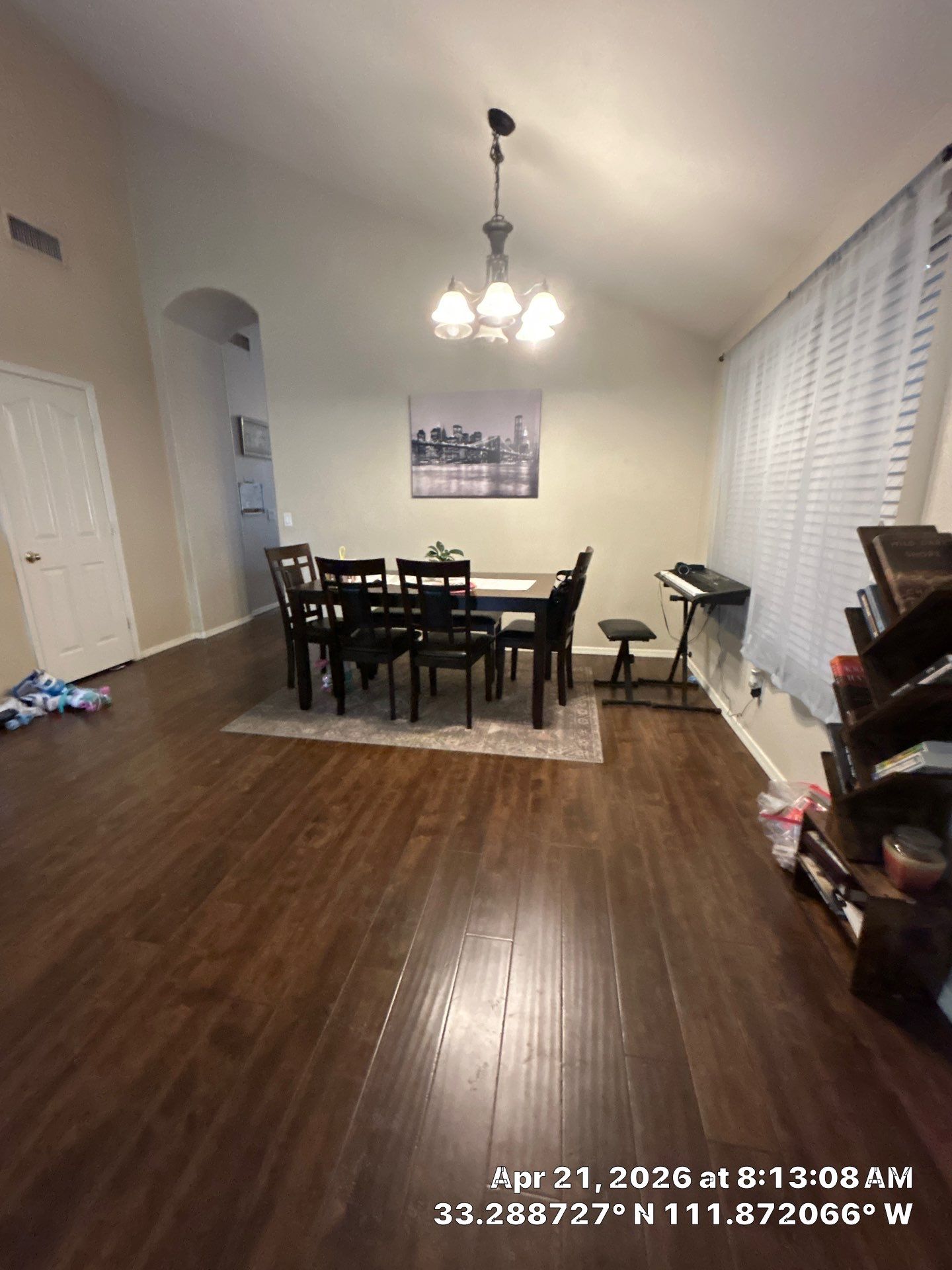 Dark Wood Laminate Floor Installation and Dining Room Renovation in Chandler by CompanyCam Sales Demo