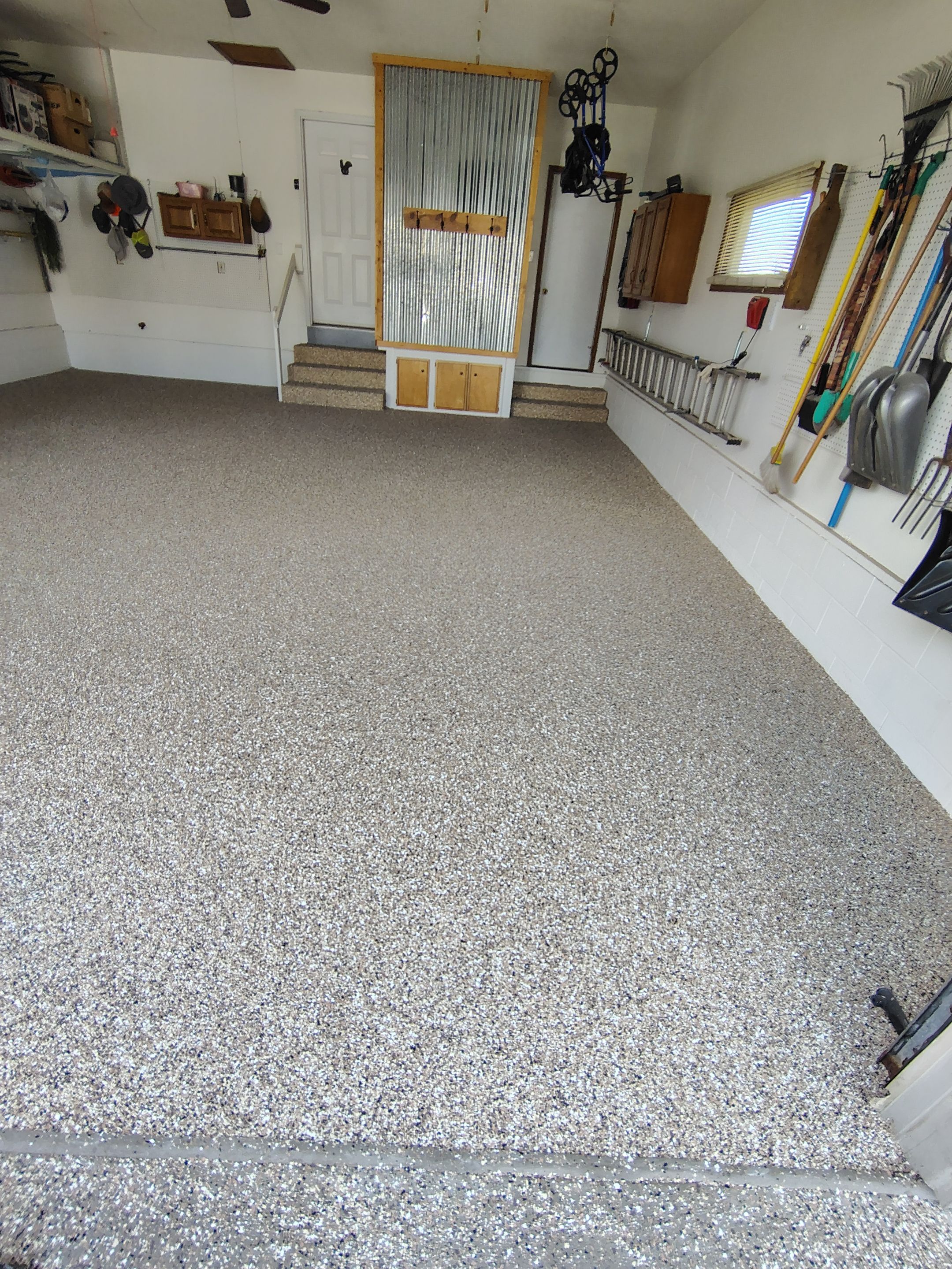 Multi-Colored Flake Epoxy Garage Floor Coating and Crack Repair by Select Painting, Coatings & Garage Cabinets