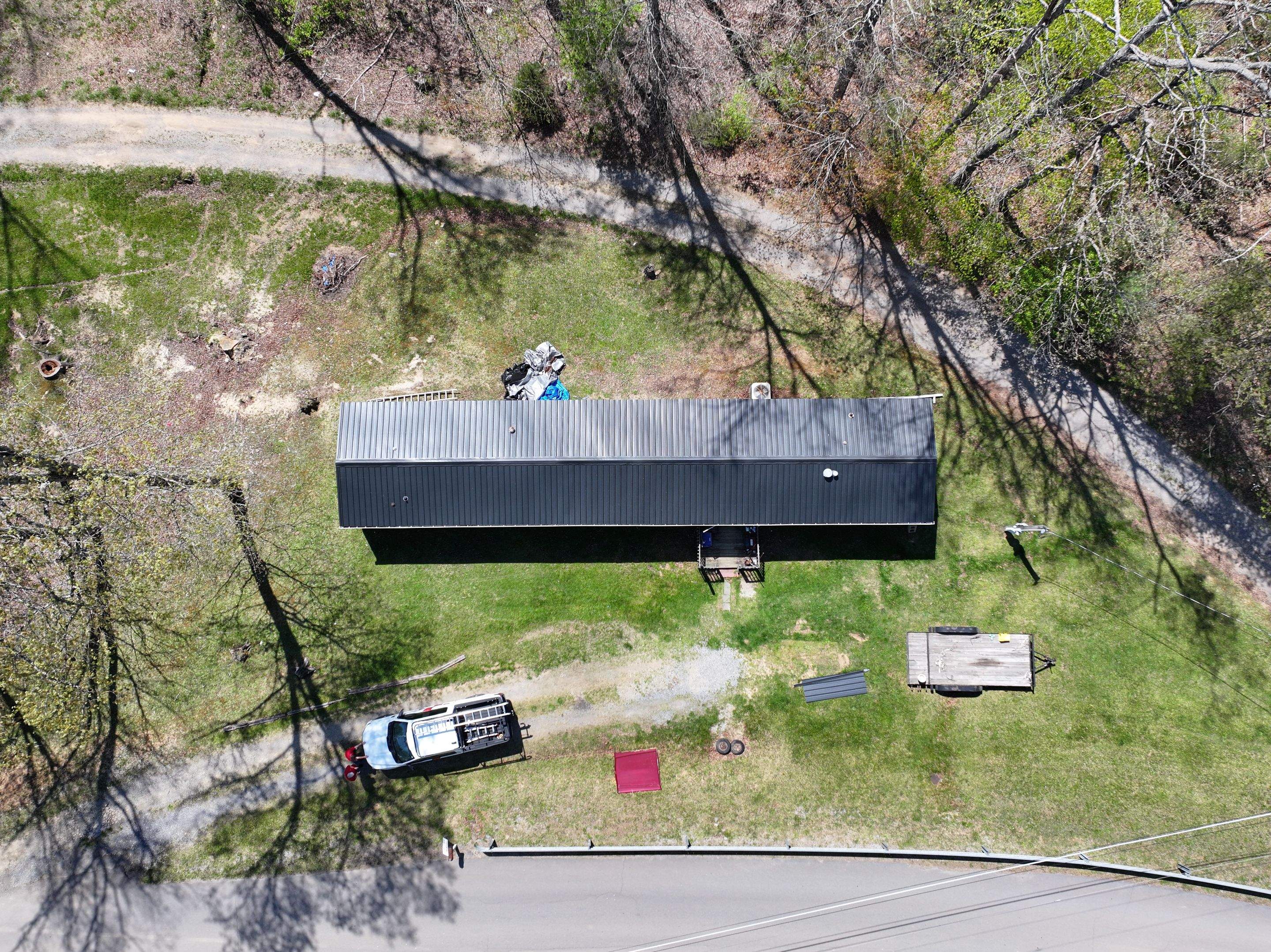 Residential Roofing Installation using 29 Gauge AG Panel by Omnia Roofing