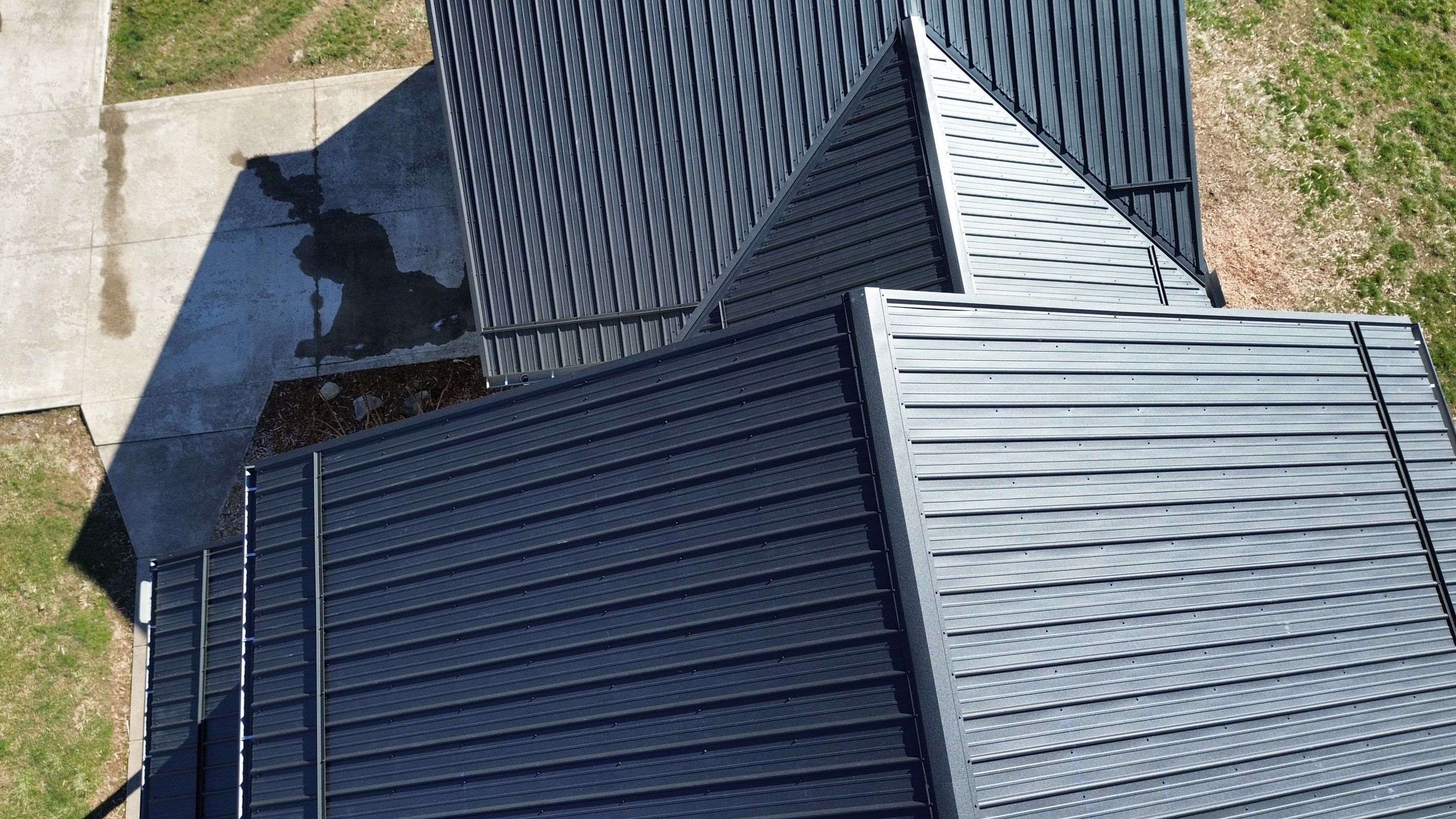 Residential Roofing Installation using Performance Panel Metal - Frost Black by RoofX 