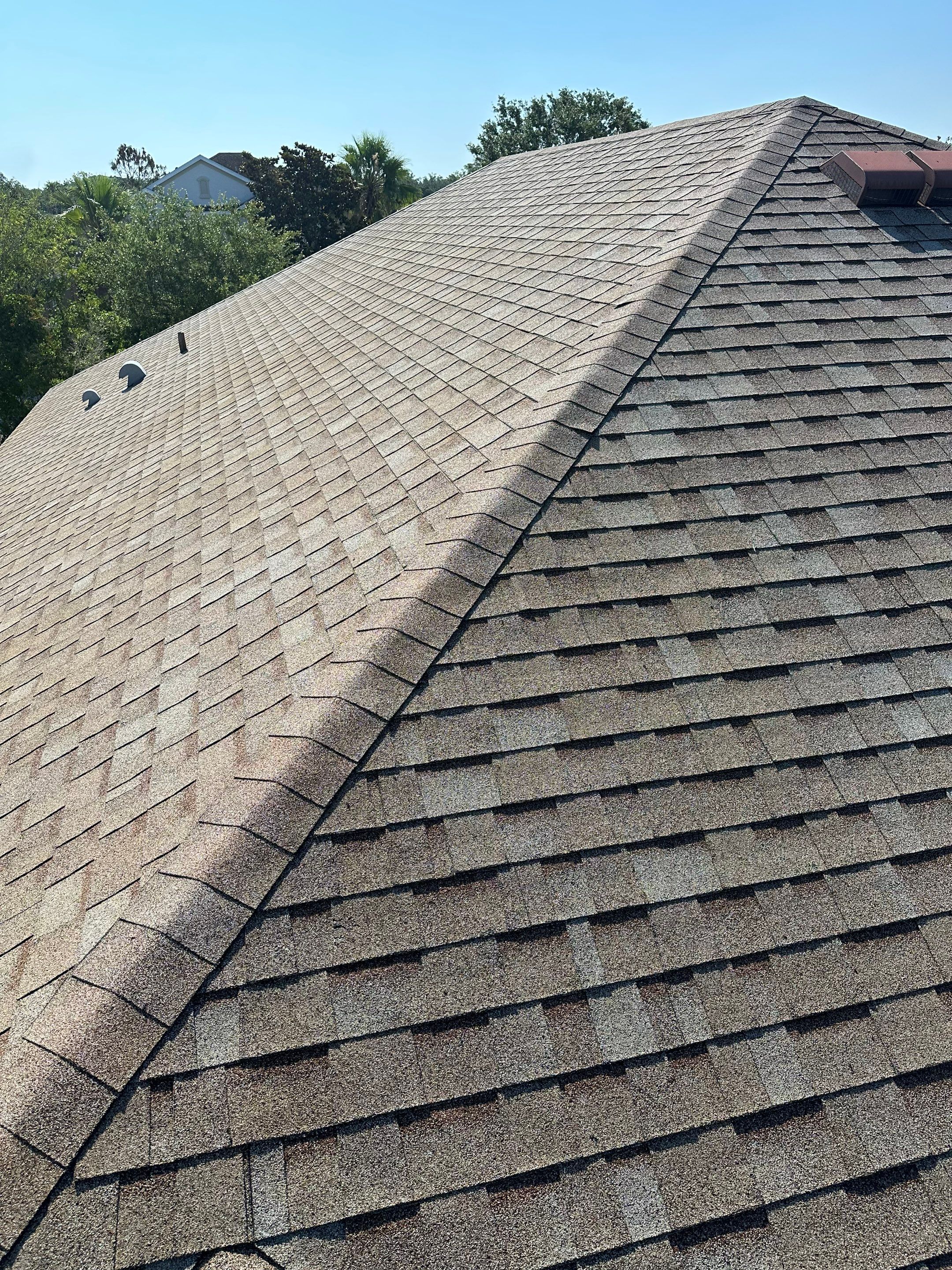 Asphalt Shingle Roof Soft Wash Cleaning & Concrete Pressure Washing in CopperStone Community, Parrish, FL by Sunshine AquaWash