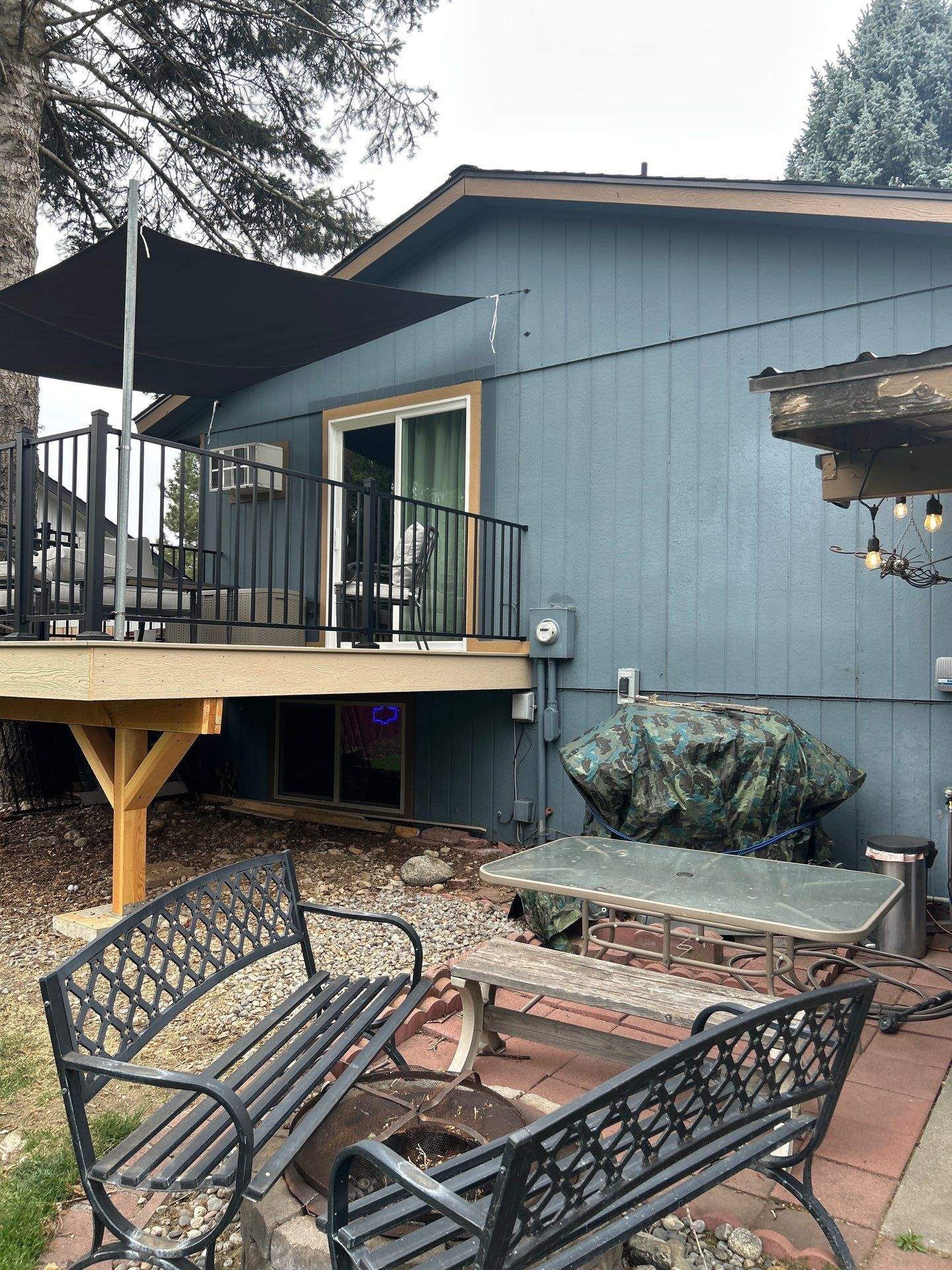 Add a platform deck below an existing elevated deck that was there prior by Home Helpers General Contracting