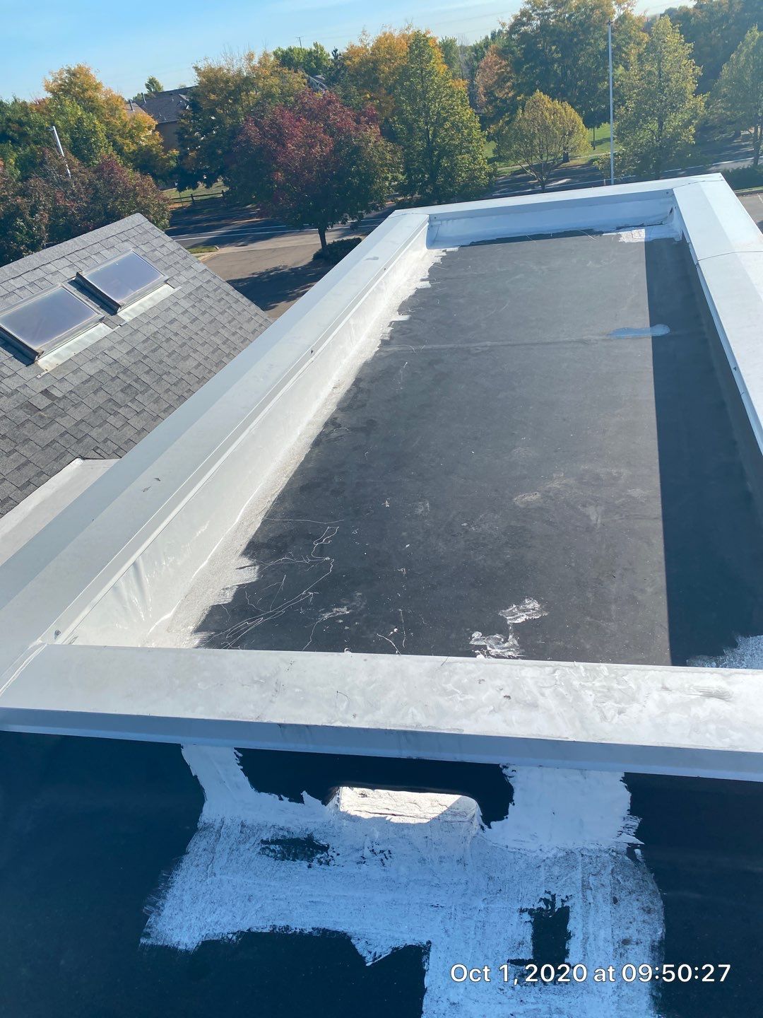Commercial Roofing Installation using American Standard Coating - S  by A to Z Roofing