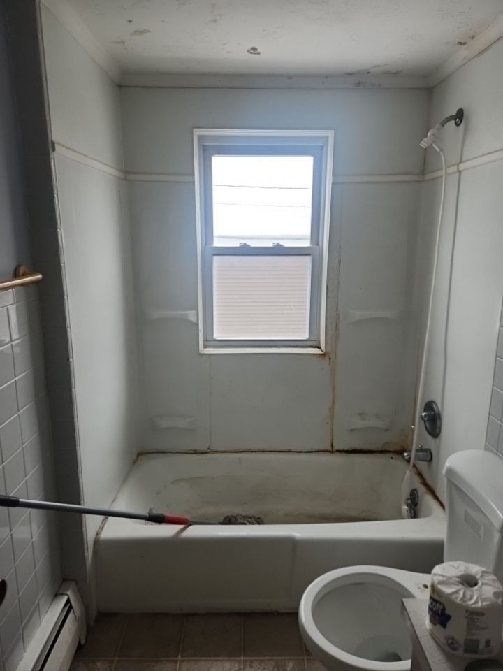 Shower wall and window trim replacement by Freedom Handyman Services