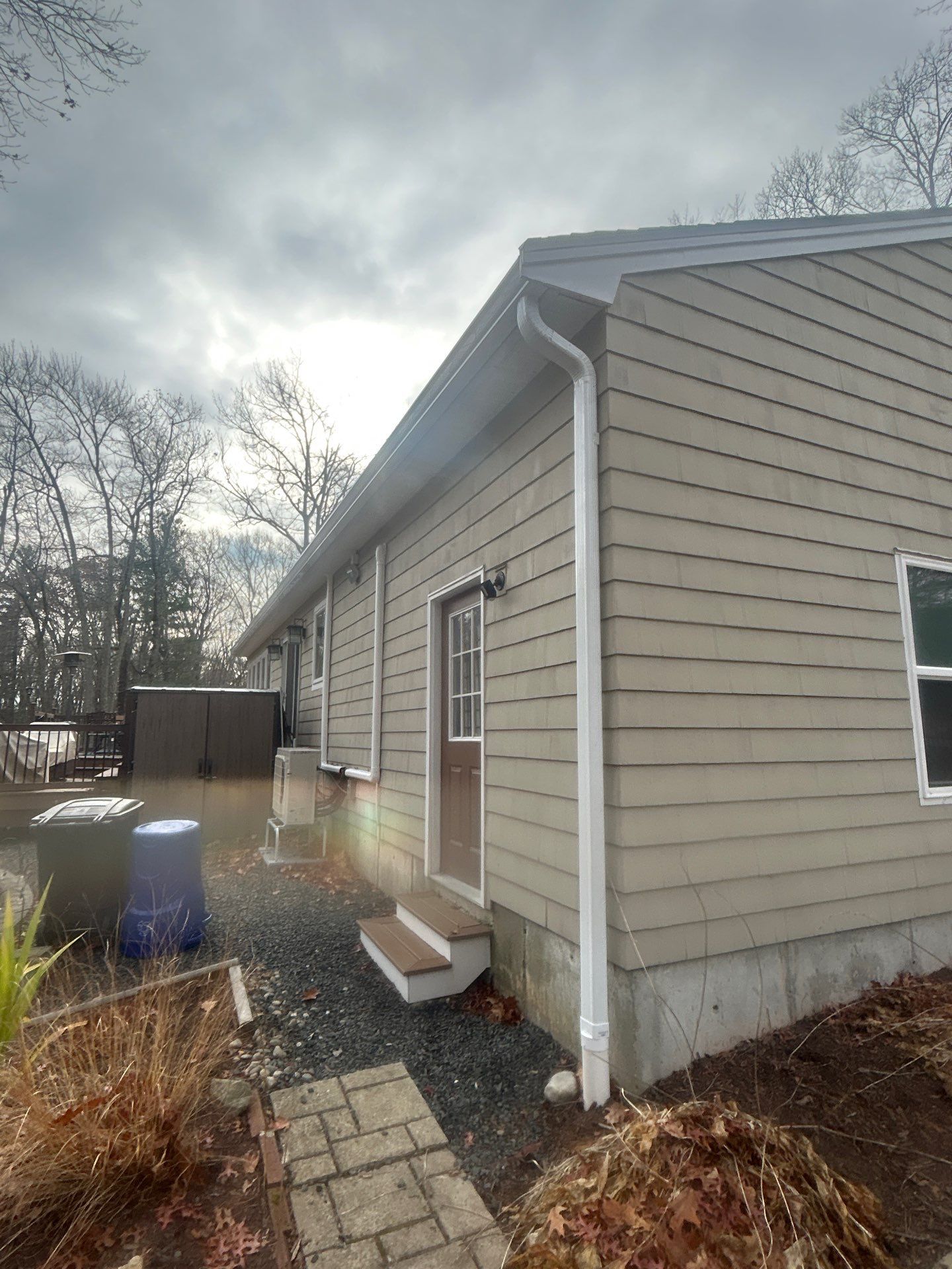 Chelmsford Garage Gutter System with French Drain Integration by Mighty Dog Roofing of Greater Middlesex County