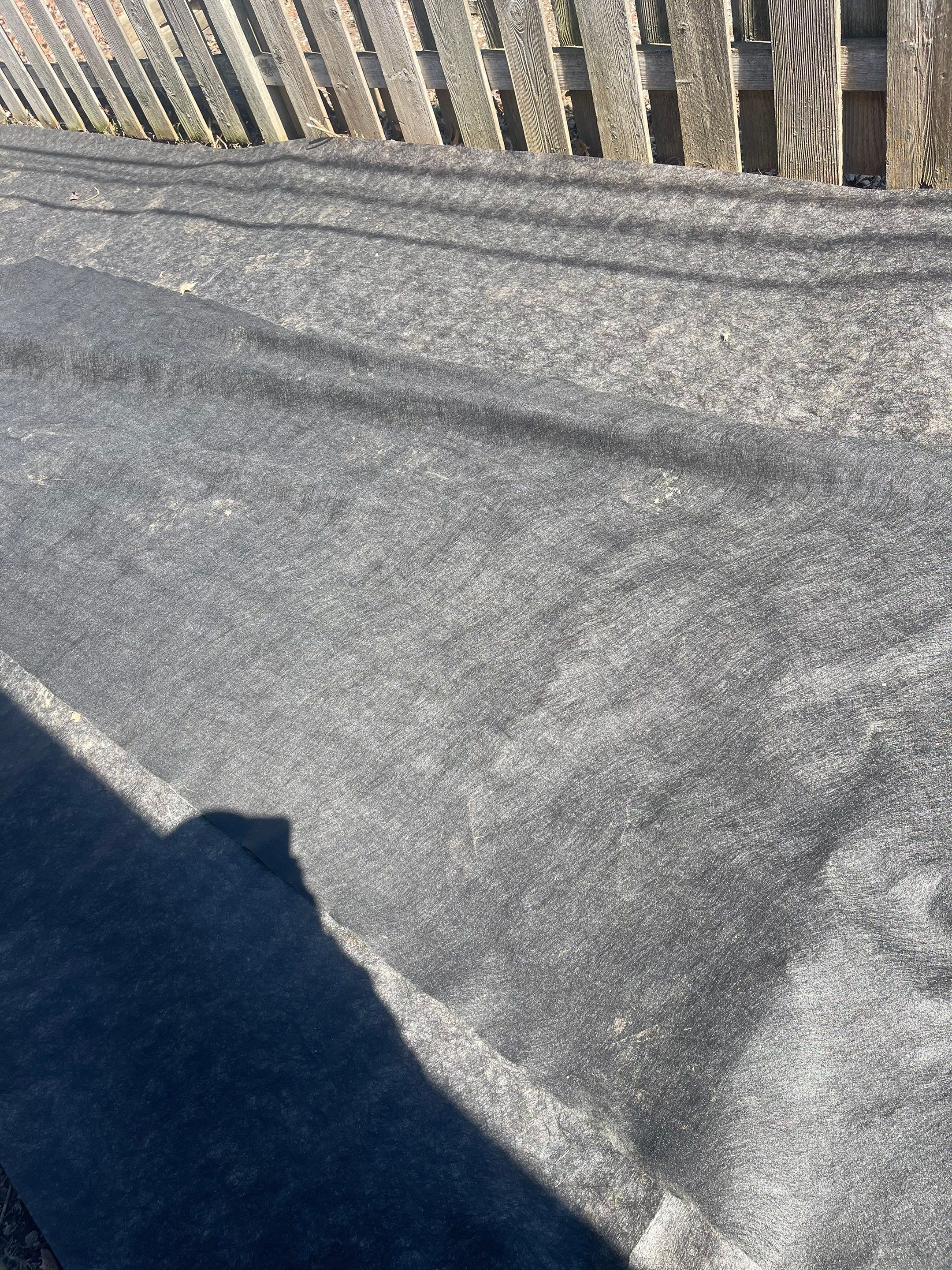 Rock Installation behind garage  by A&N 