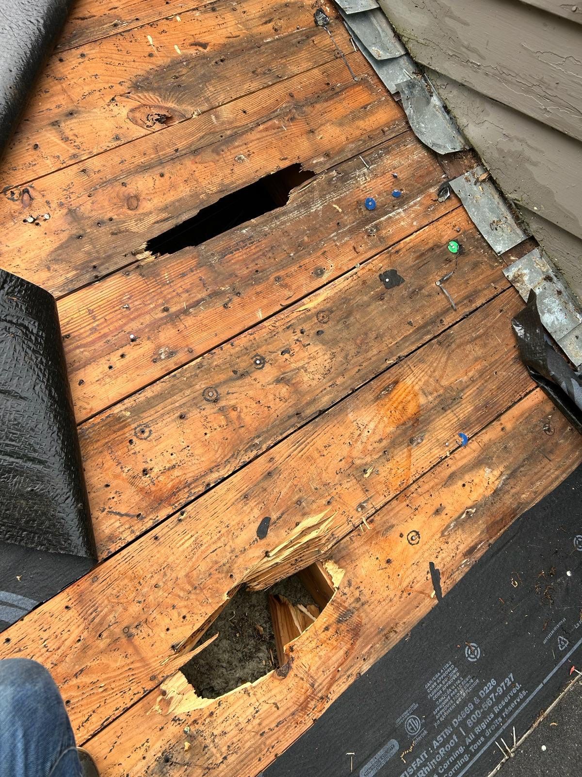 Residential Roof Repair and Decking Replacement After Tree Damage by Revival Roofing Services