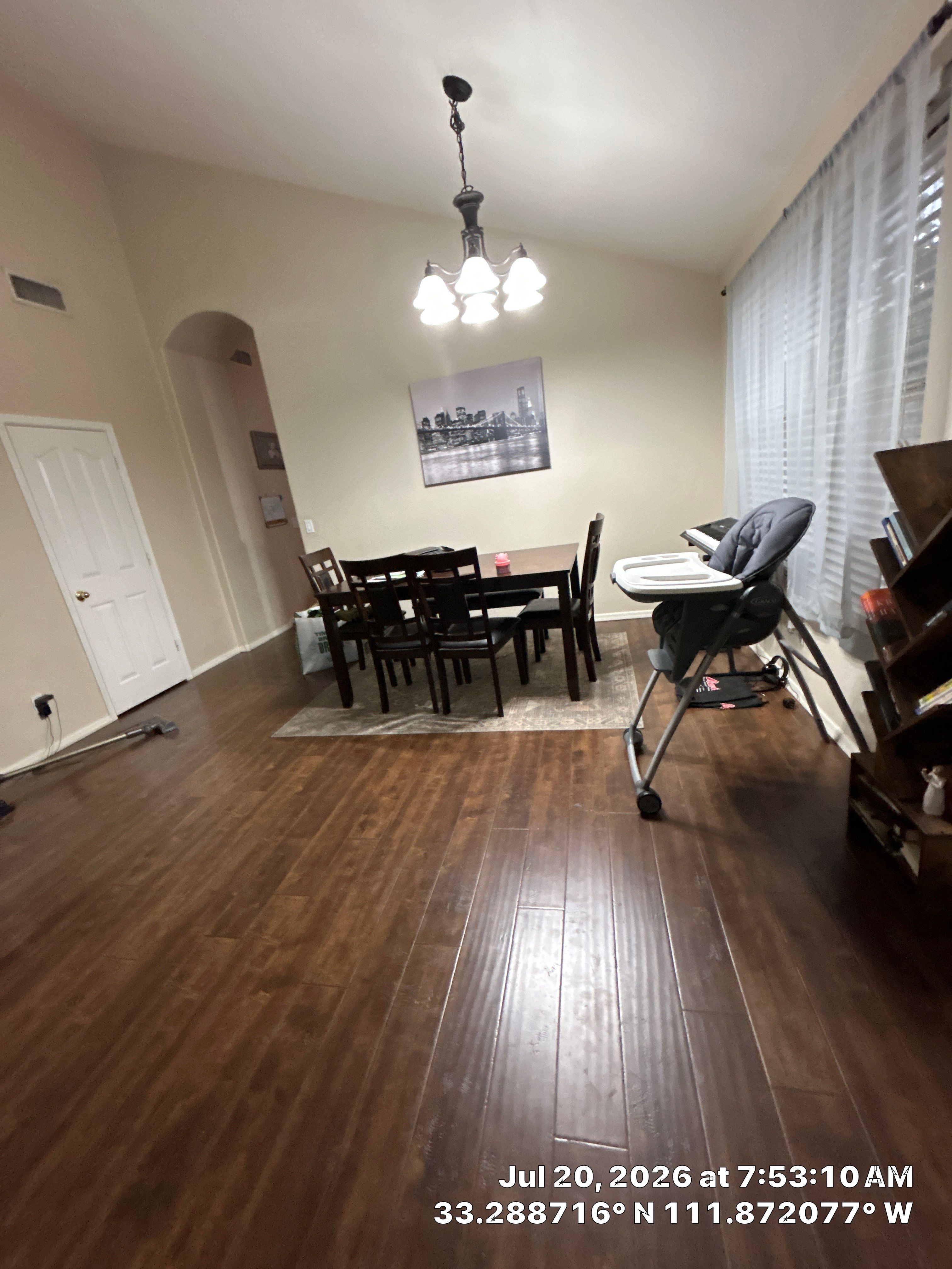 Dark Wood-Look Laminate Flooring Installation in Chandler Dining Room by CompanyCam Sales Demo