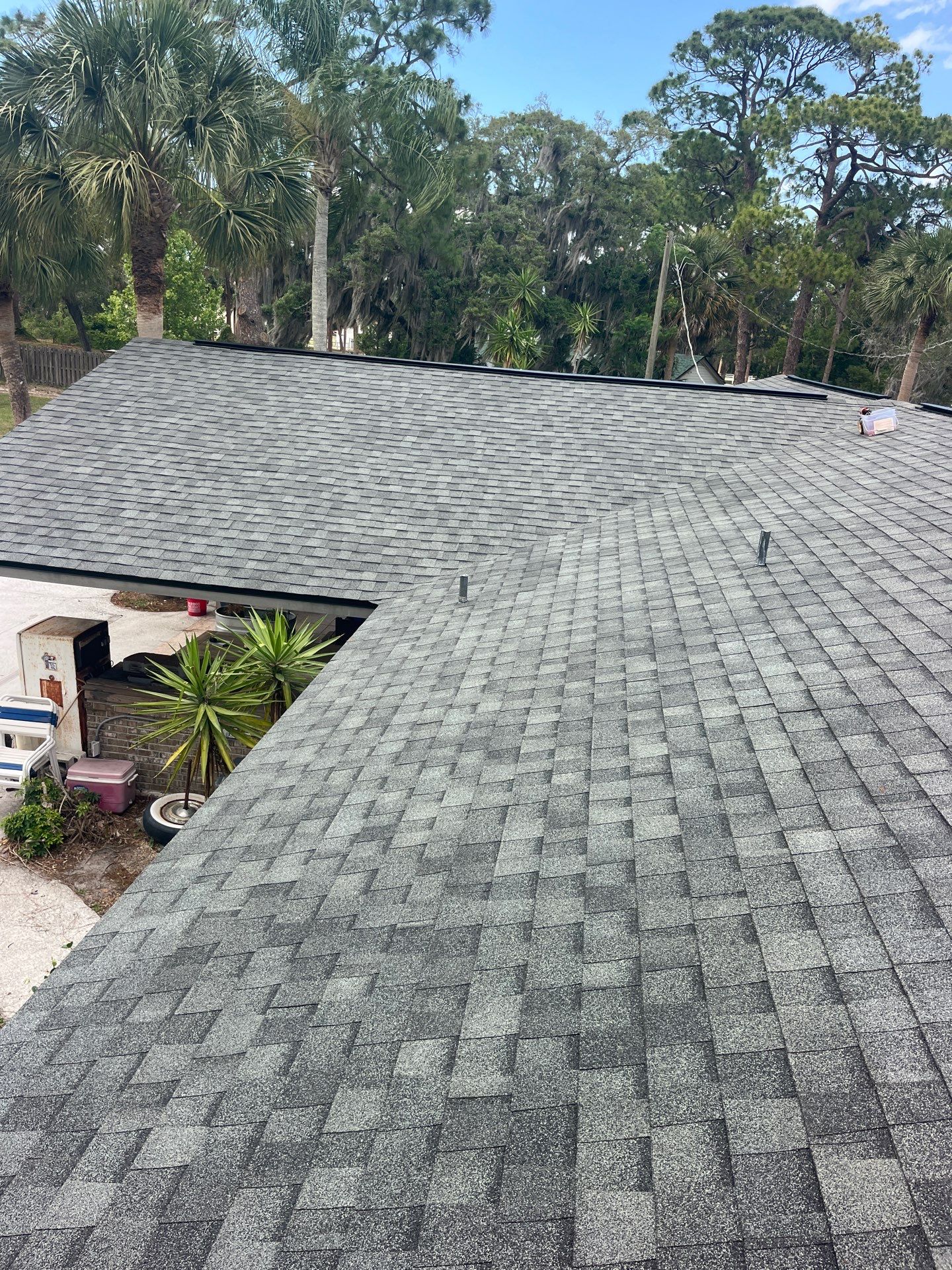 Roof Replacement with Architectural Shingles and Chimney Repair in Cocoa by Wiedmann Construction & Roofing