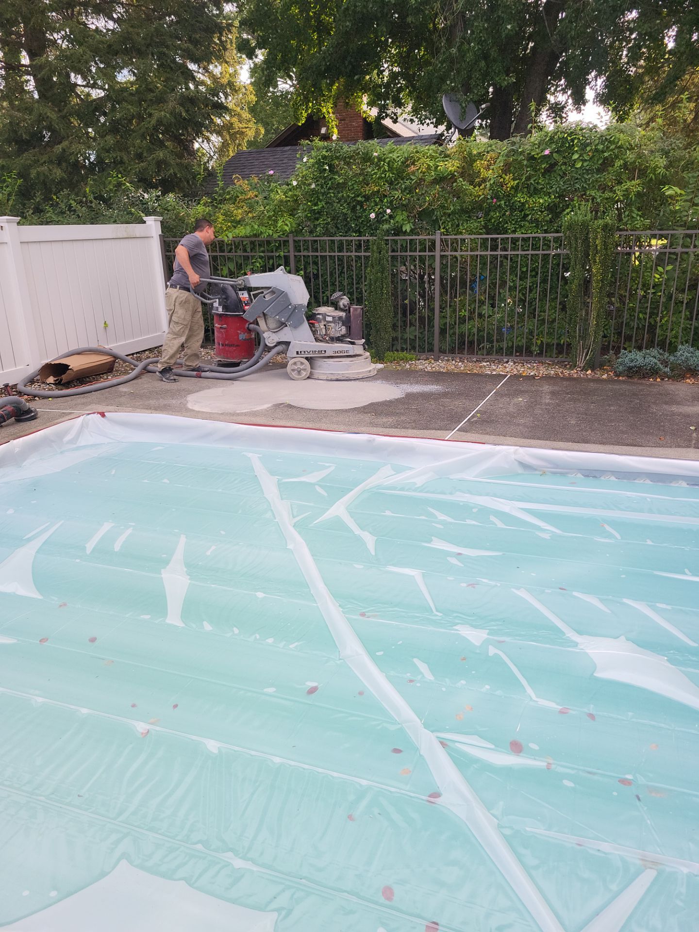 Blue Granite Pool Patio Concrete Coating in Lincoln Park by Spectrum Painting, LLC