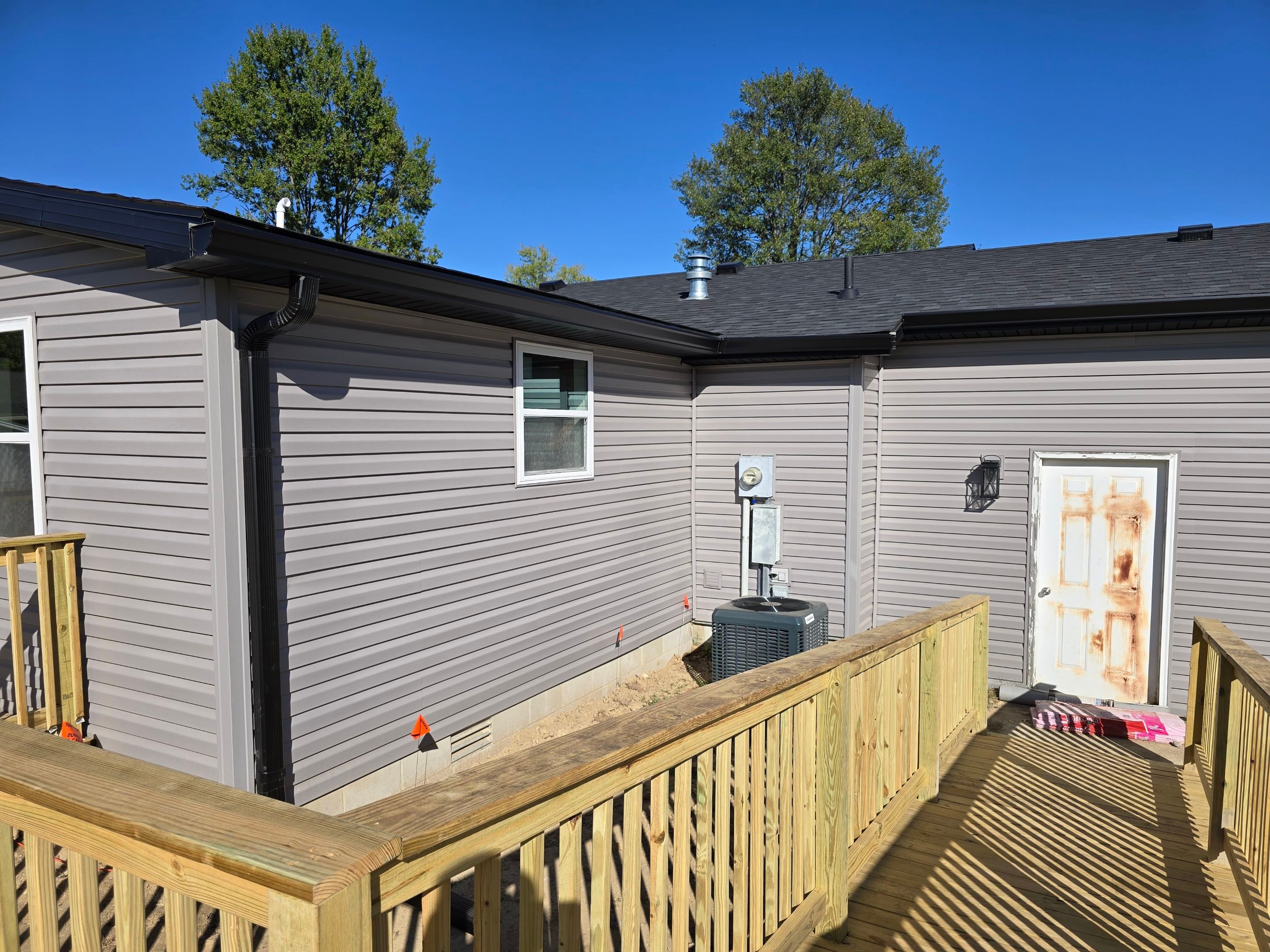 Major Addition using Vinyl Siding by Leach and Brown Construction LLC