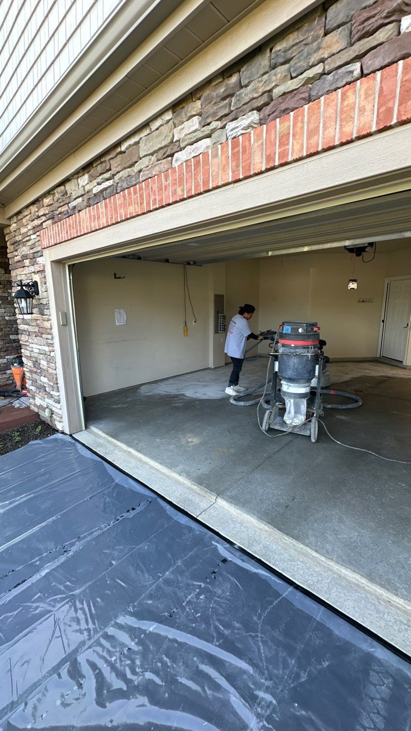 Porch + Walkway + Garage Project in Renfrew by Floors in a Day, Inc
