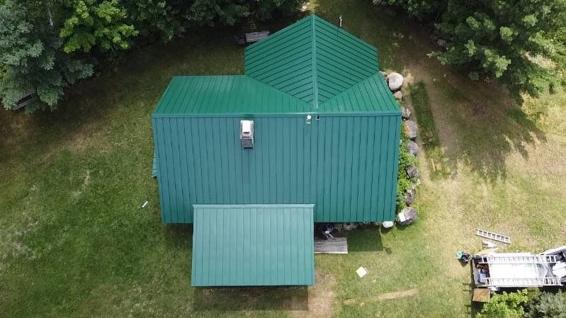 Roof Replacement using 16" Standing Seam Panels by Jay Carter Roofing & Sheet Metal