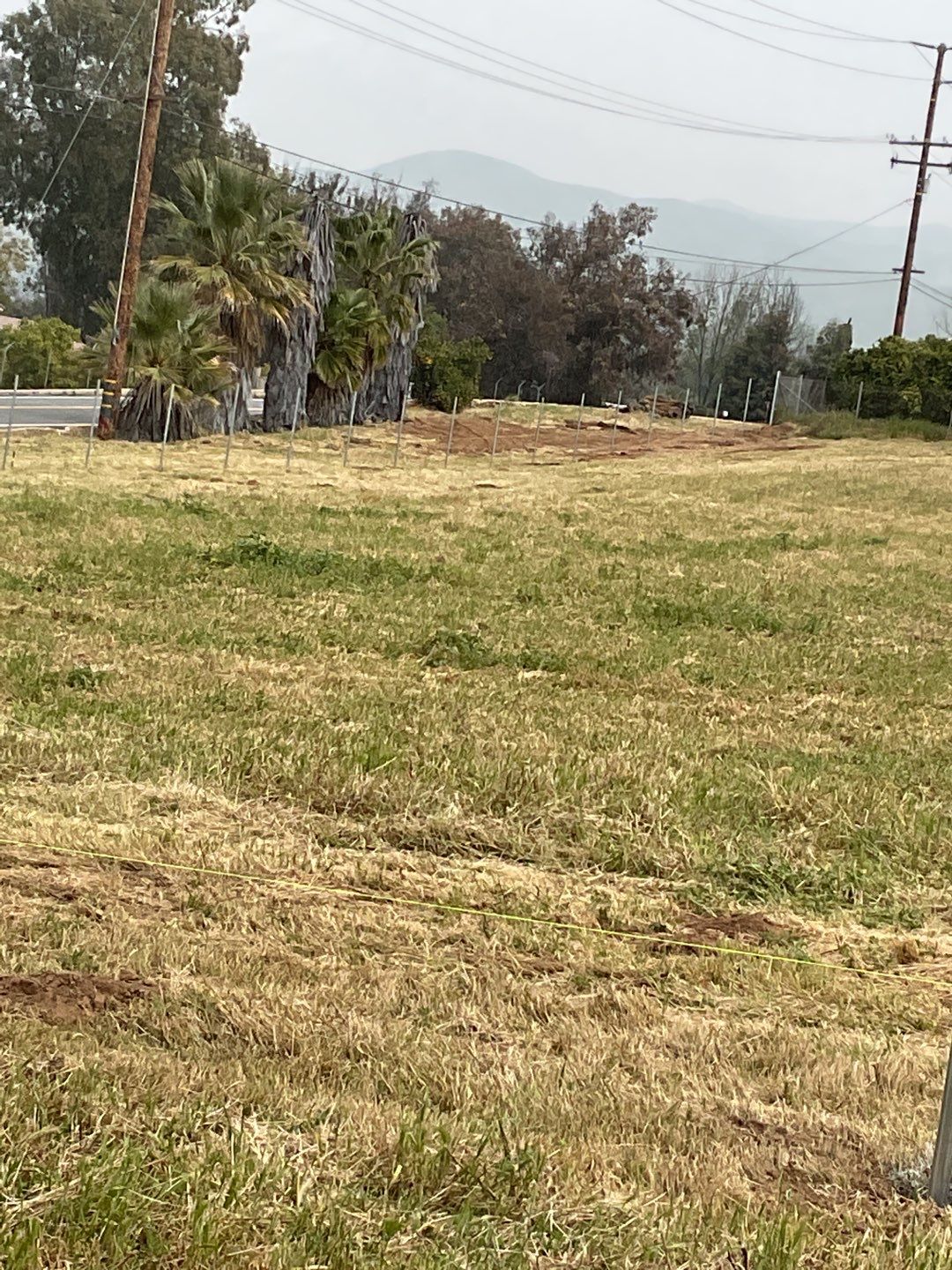 Fence installation using chain link wire by Fence Guys Inc. 