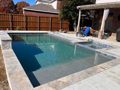 Geometric Pool with Raised Spa