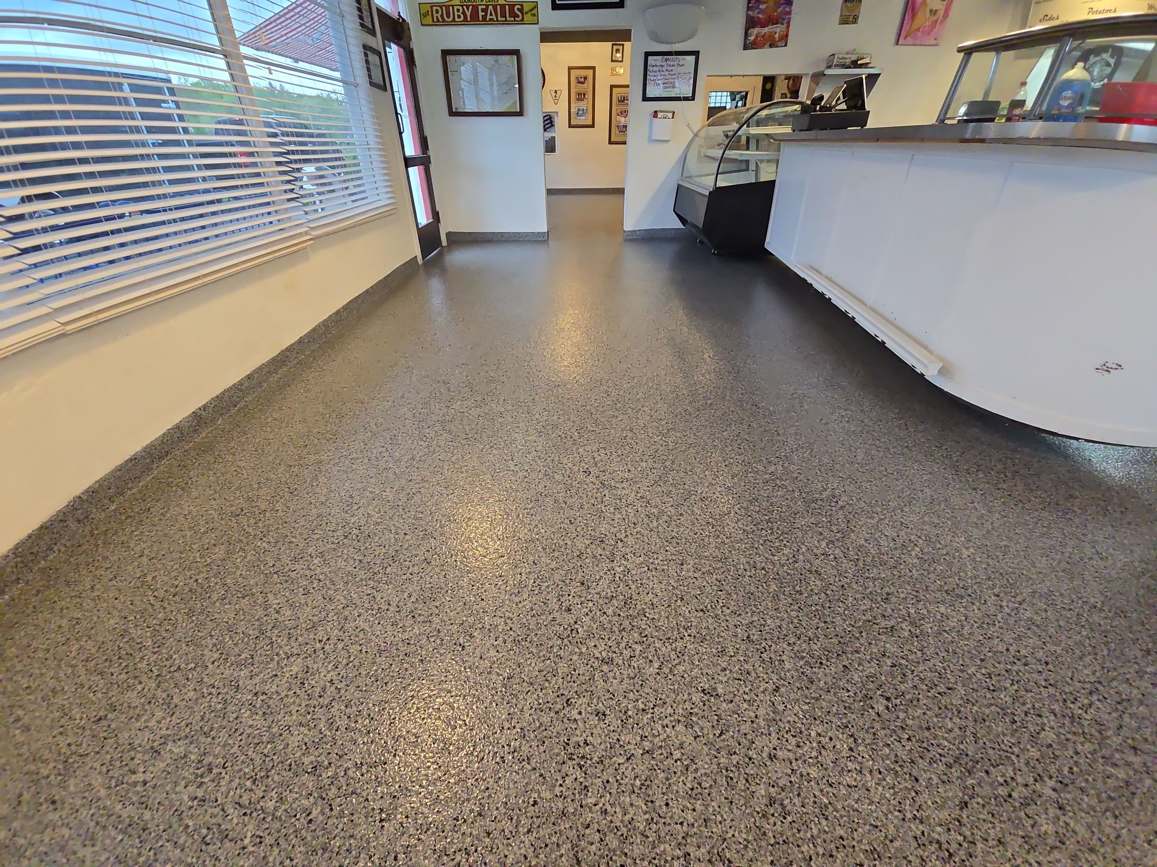 Check it out! Steelwheel Corner gets a new floor! by Elite Floor Solutions