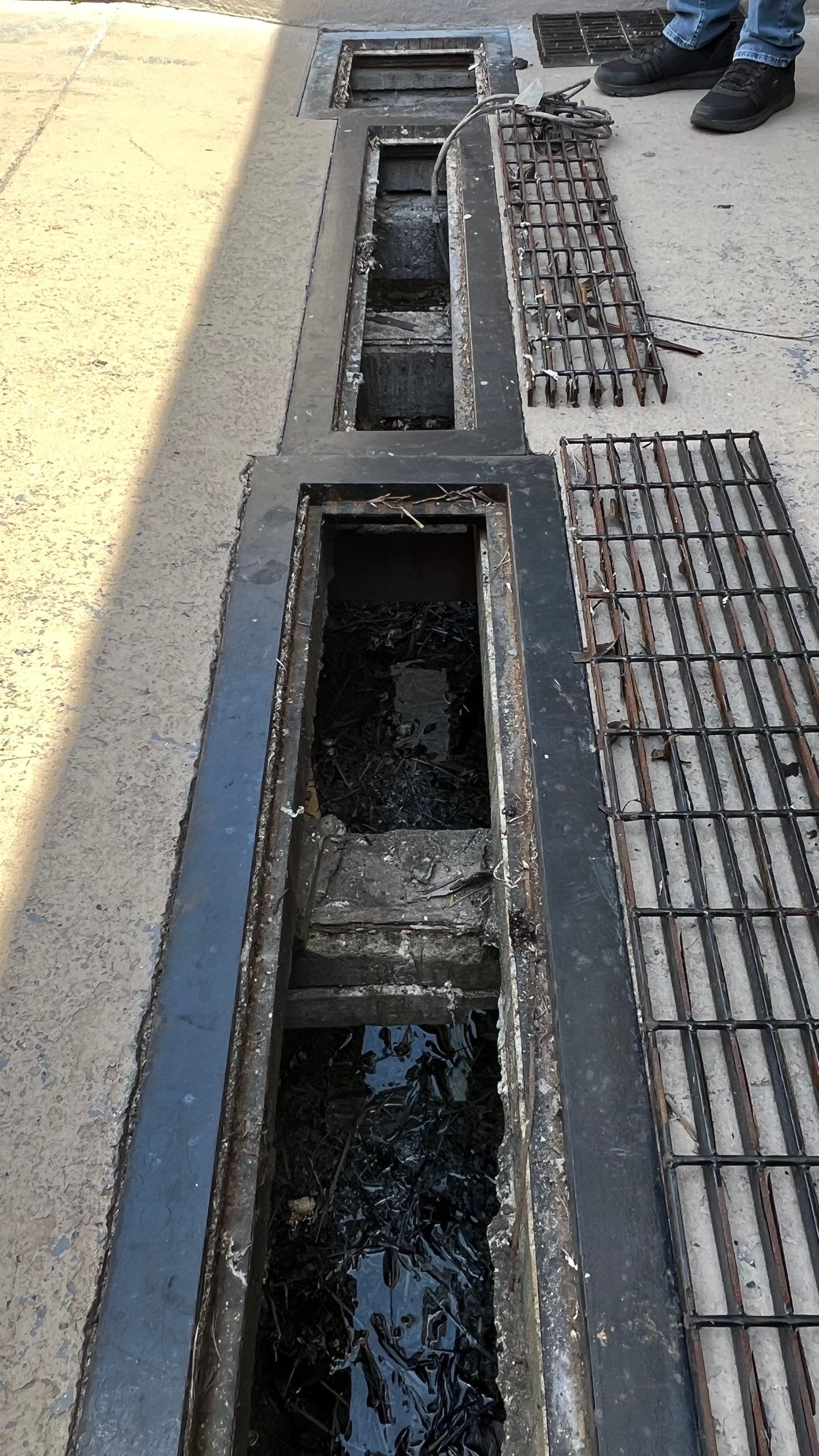 Condo Channel Drain and Sump Pit Cleaning by APS Power & Water