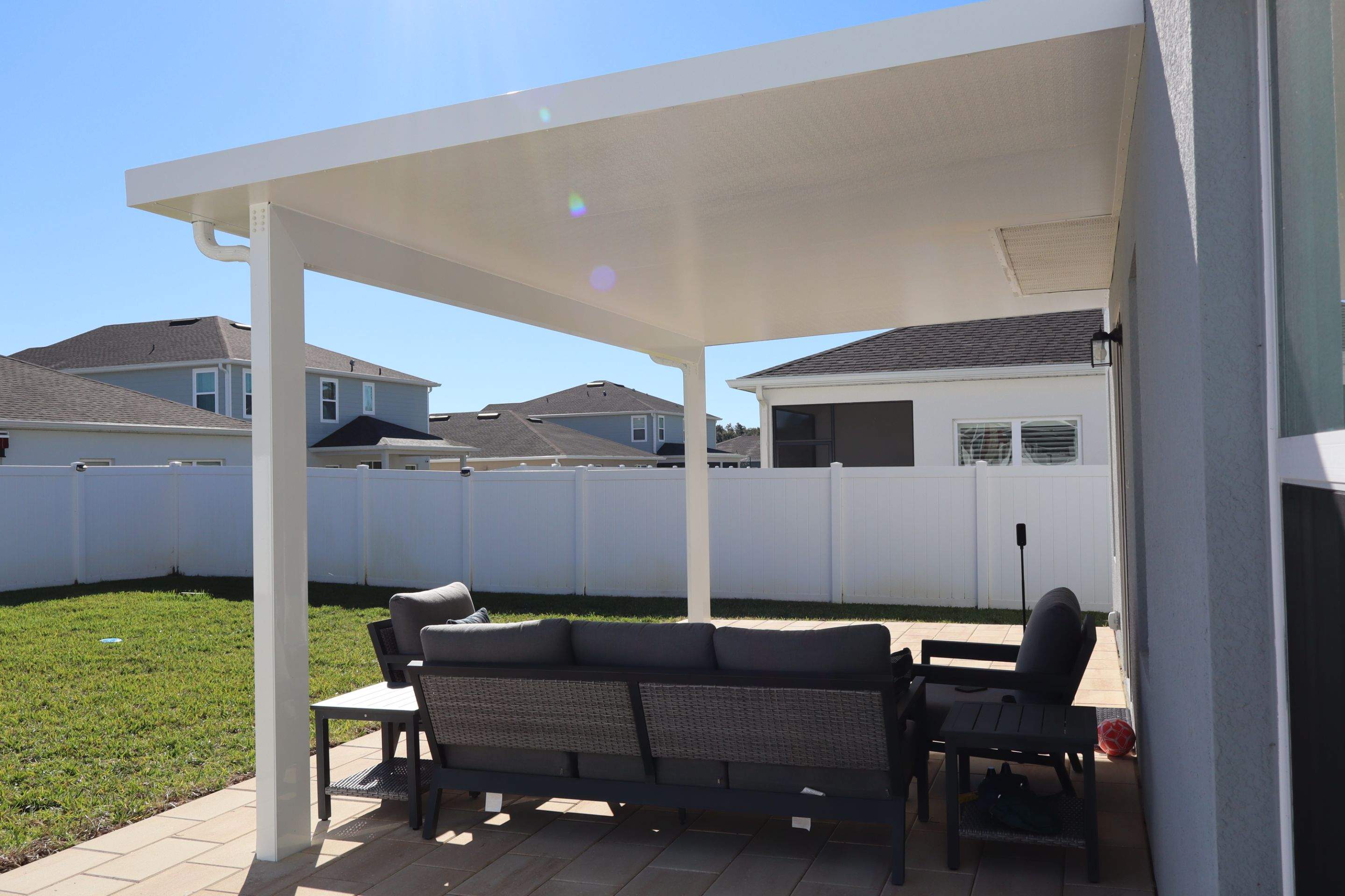 Patio cover and pavers  using Aluminum  by Orlando pergolas 