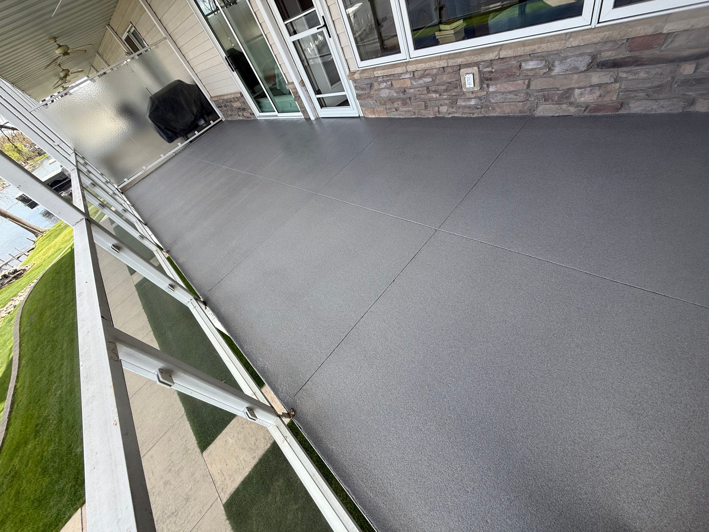 Dark Gray Slip-Resistant Concrete Coating for Arnolds Park Balcony by Select Painting, Coatings & Garage Cabinets