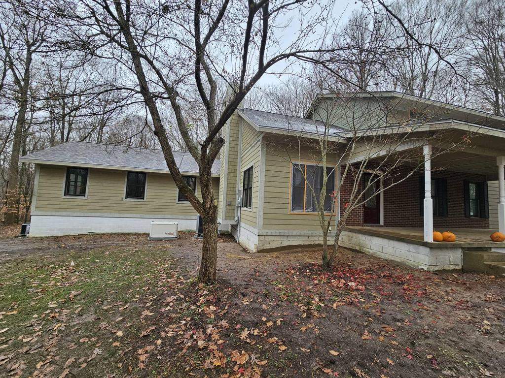 Siding Installation using Primed James Hardie & Straight Edge Shakes by Koontz Construction