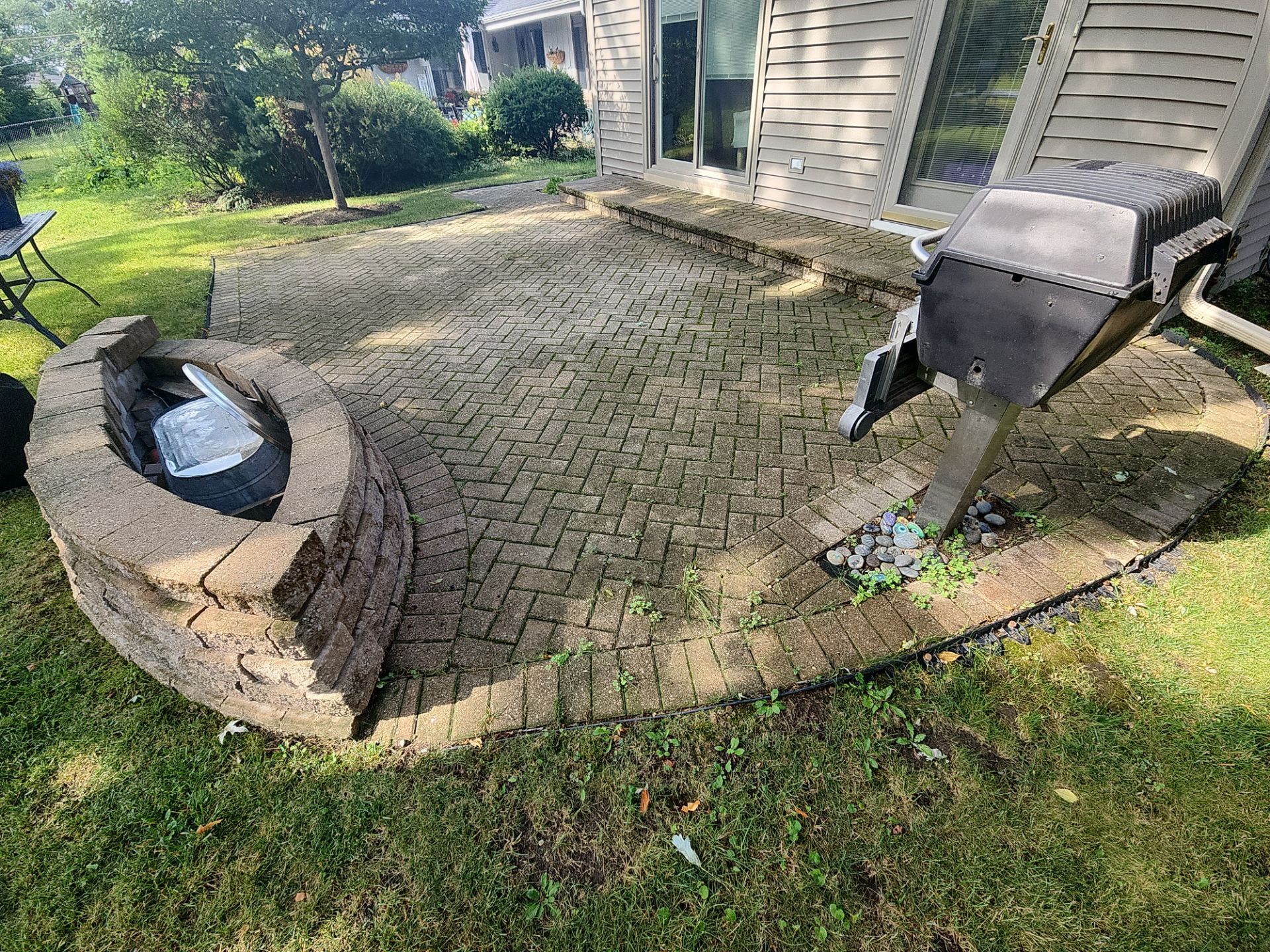 Arlington Heights Brick paver repair, cleaning and sealing by Northern Power Washing LLC.