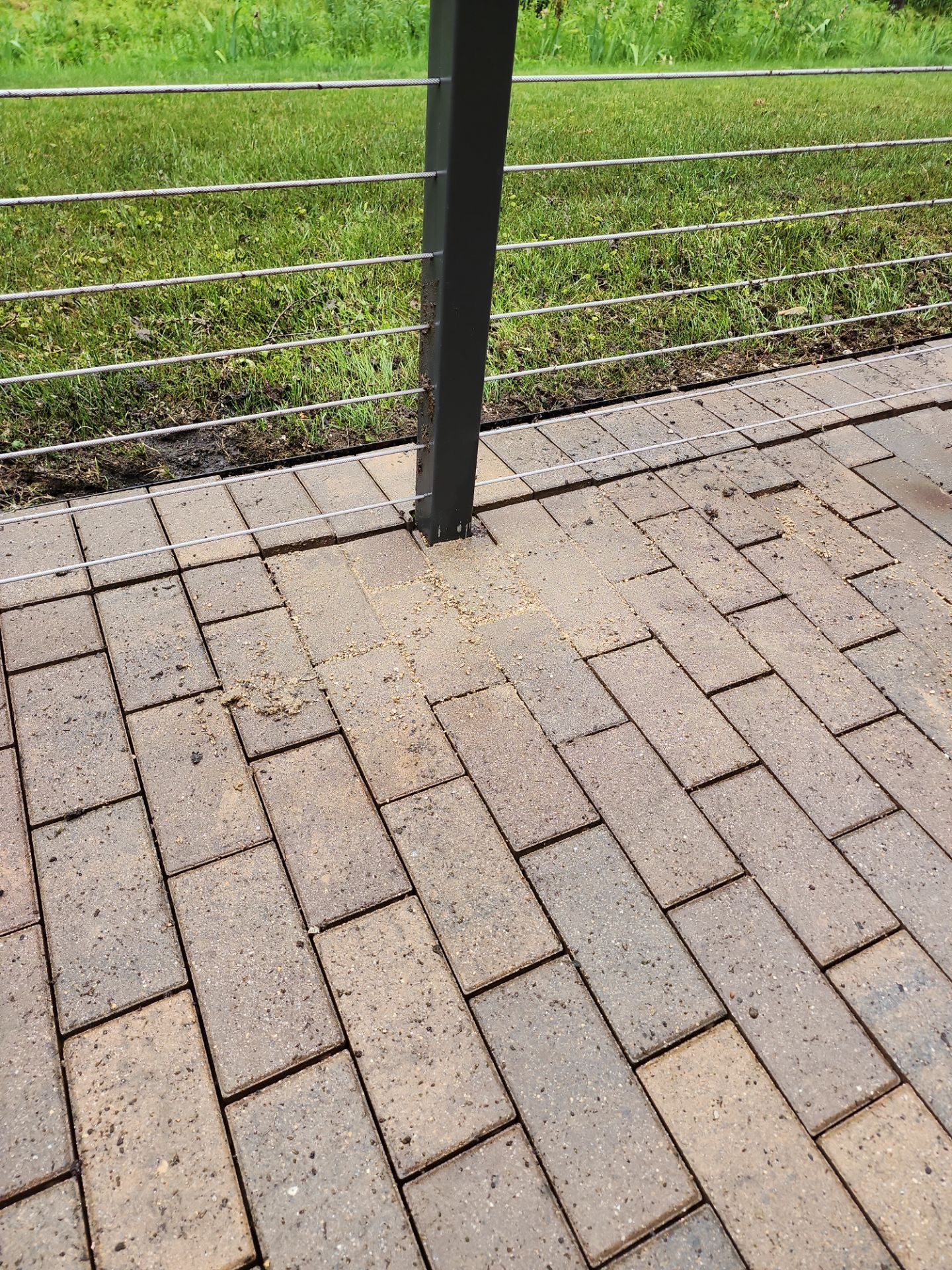 Brick paver repair, cleaning, sealing and poly sanding by Northern Power Washing LLC.