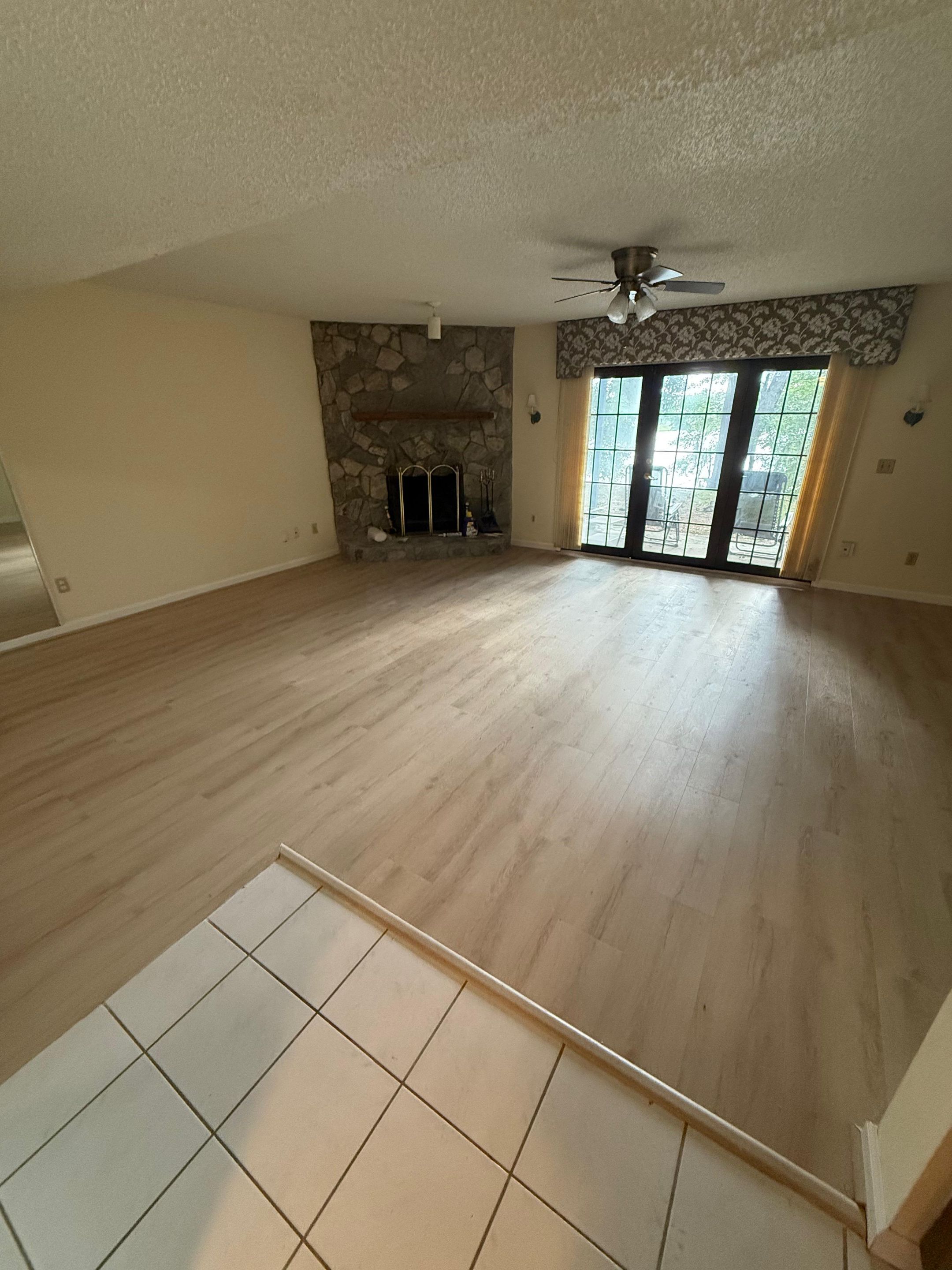 Full Home Flooring & 2-Bathroom Renovation by urban green energy llc