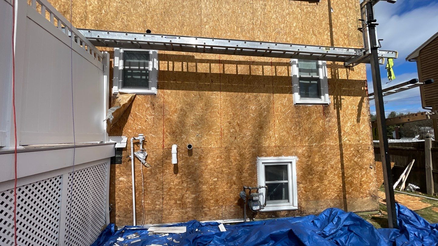 Complete Exterior Renovation with New Siding & Gutters   by Sensible Home Solutions