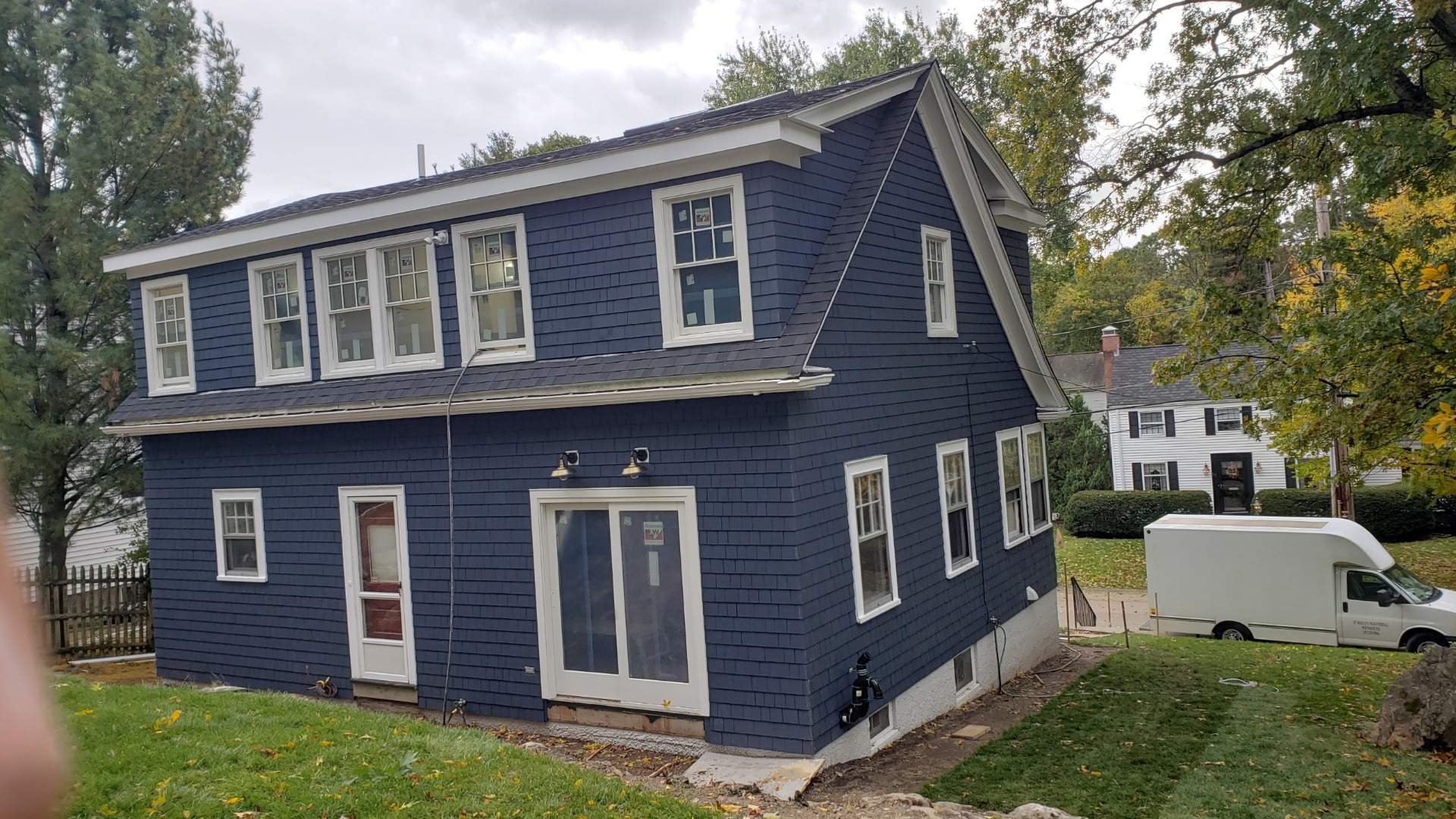 Siding Installation using Red Cedar by UBrothers Construction