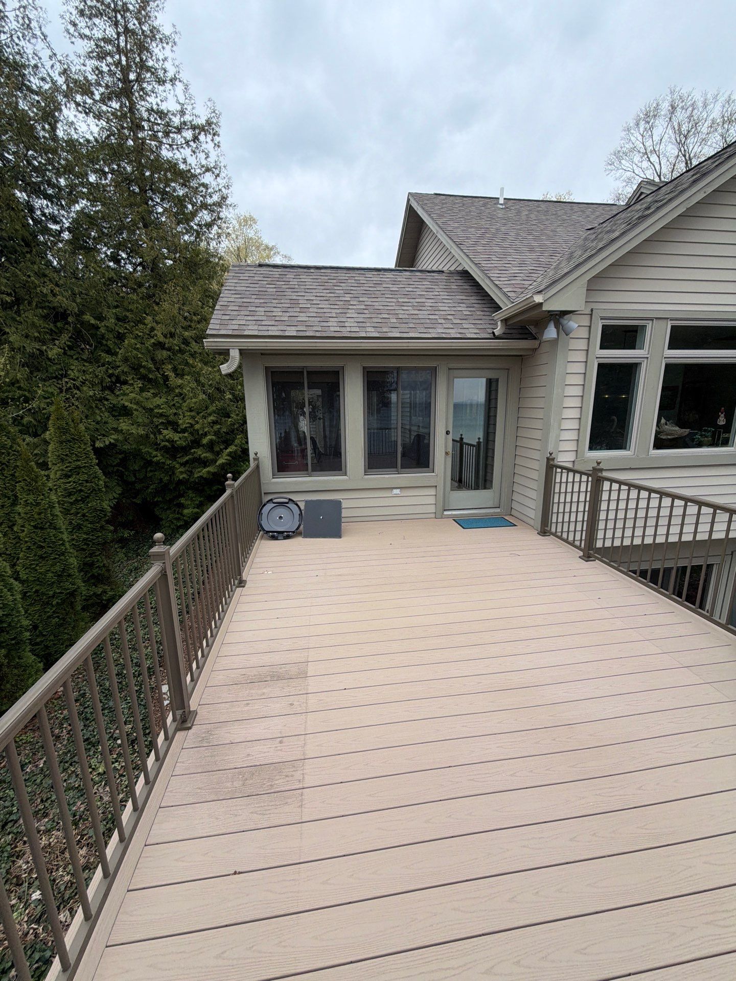Custom Gutter Helmet Protection for Residential Roof in Suttons Bay by Rainbow Seamless Systems