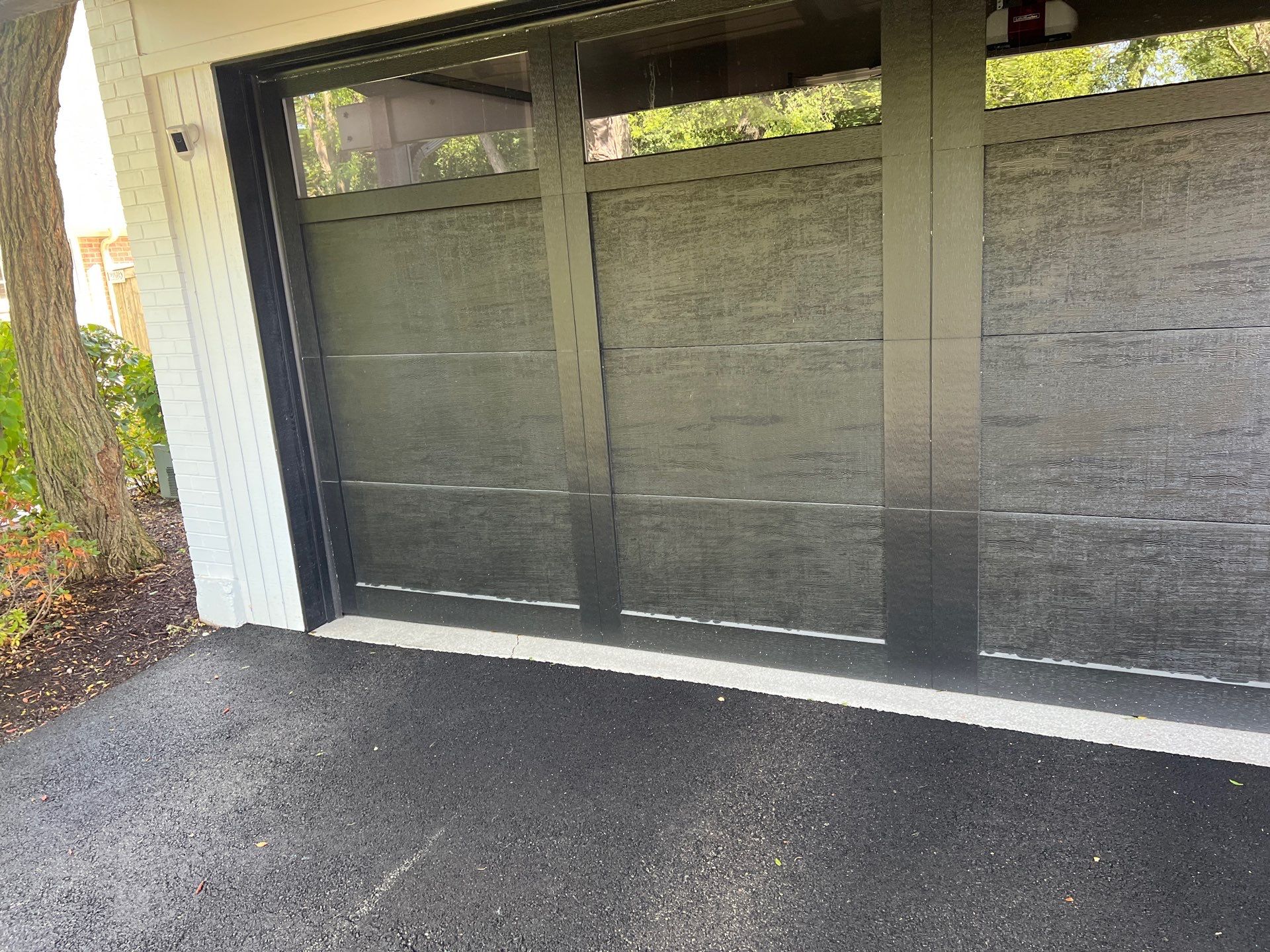 Complete Exterior House, Bluestone & Garage Floor Cleaning by Northern Power Washing LLC.