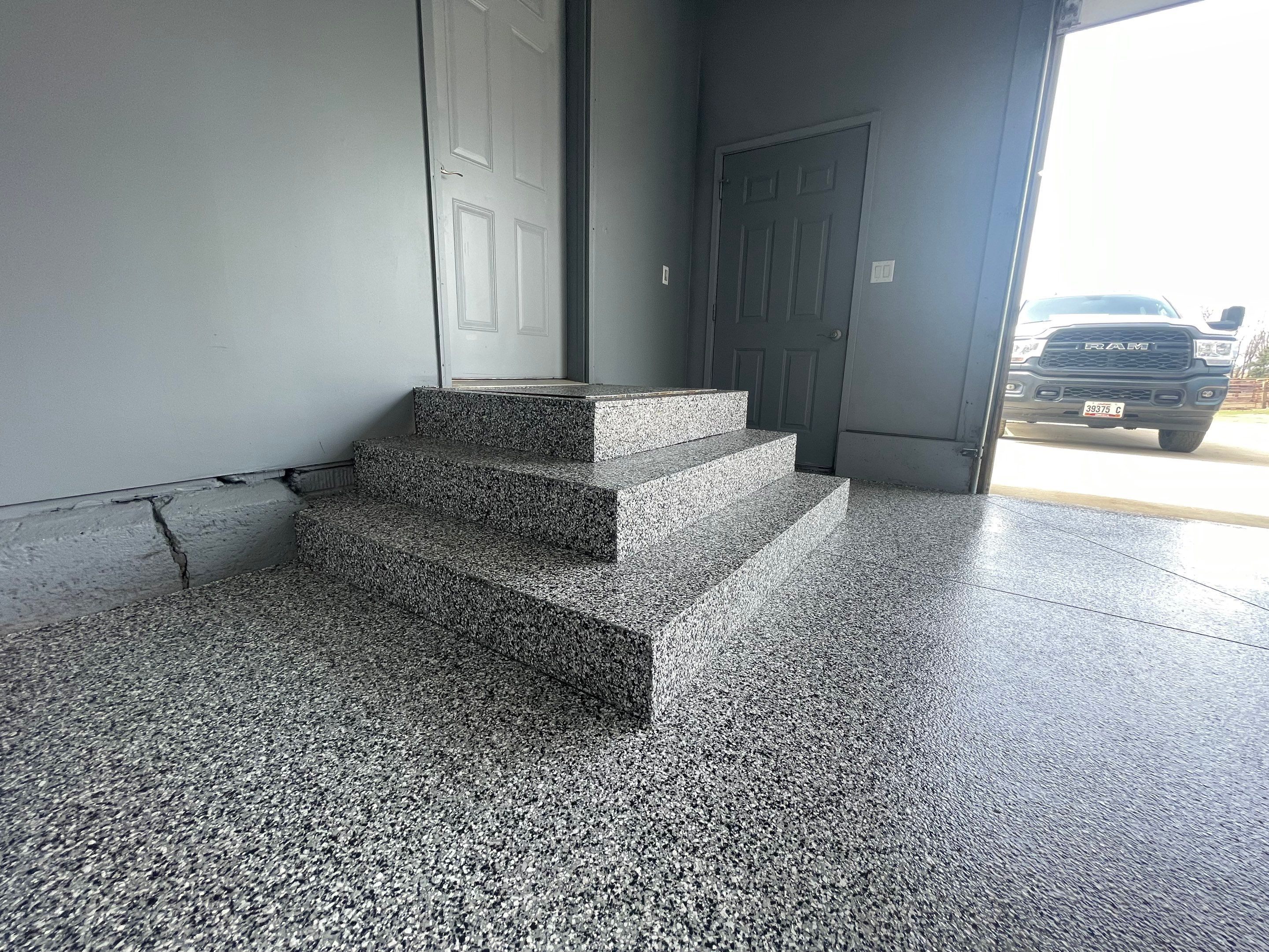 Grey Granite-Style Garage Floor Coating and Stairs in Hartford by Select Painting, Coatings & Garage Cabinets