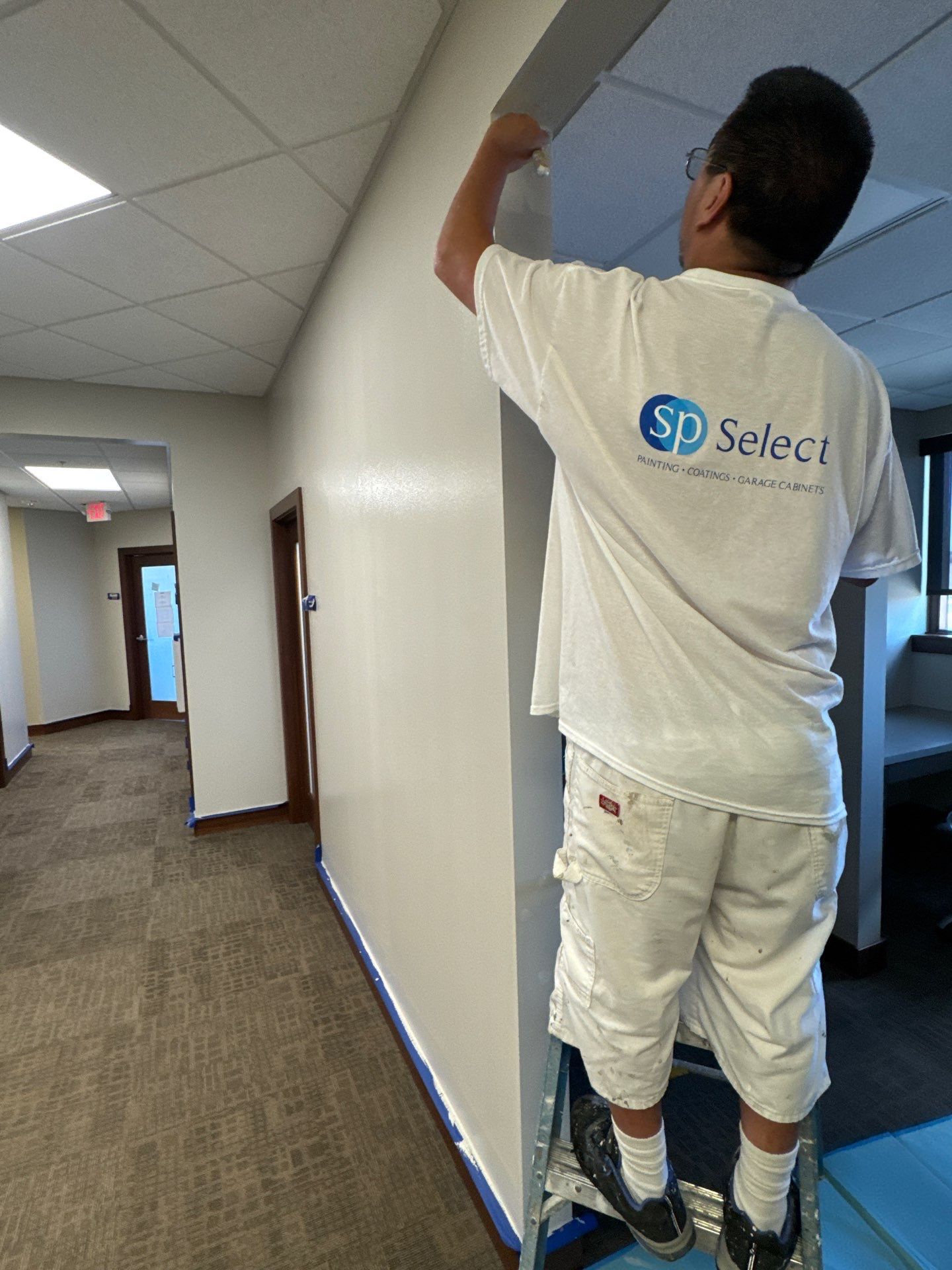 Commercial Office Interior Remodel and Modern Suite Refresh in Sioux Falls by Select Painting, Coatings & Garage Cabinets