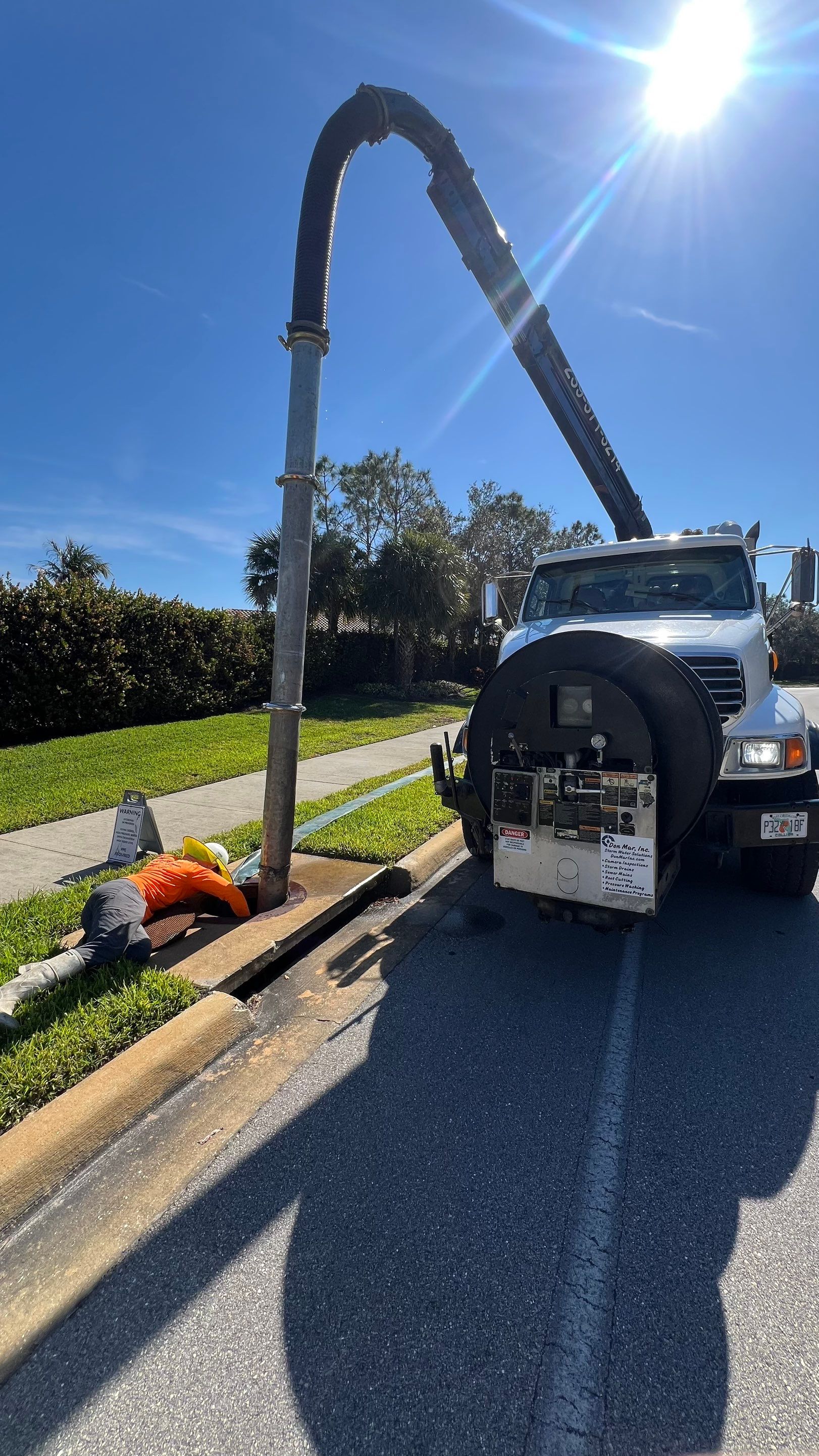 Naples Association Catch Basin Cleaning using Vactor Truck by Don Mar, Inc. Storm Water Solutions