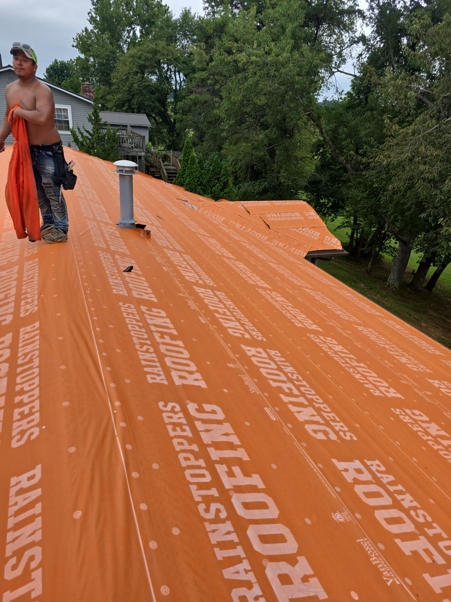 Residential Roofing Installation using Metal by Rainstoppers Roofing