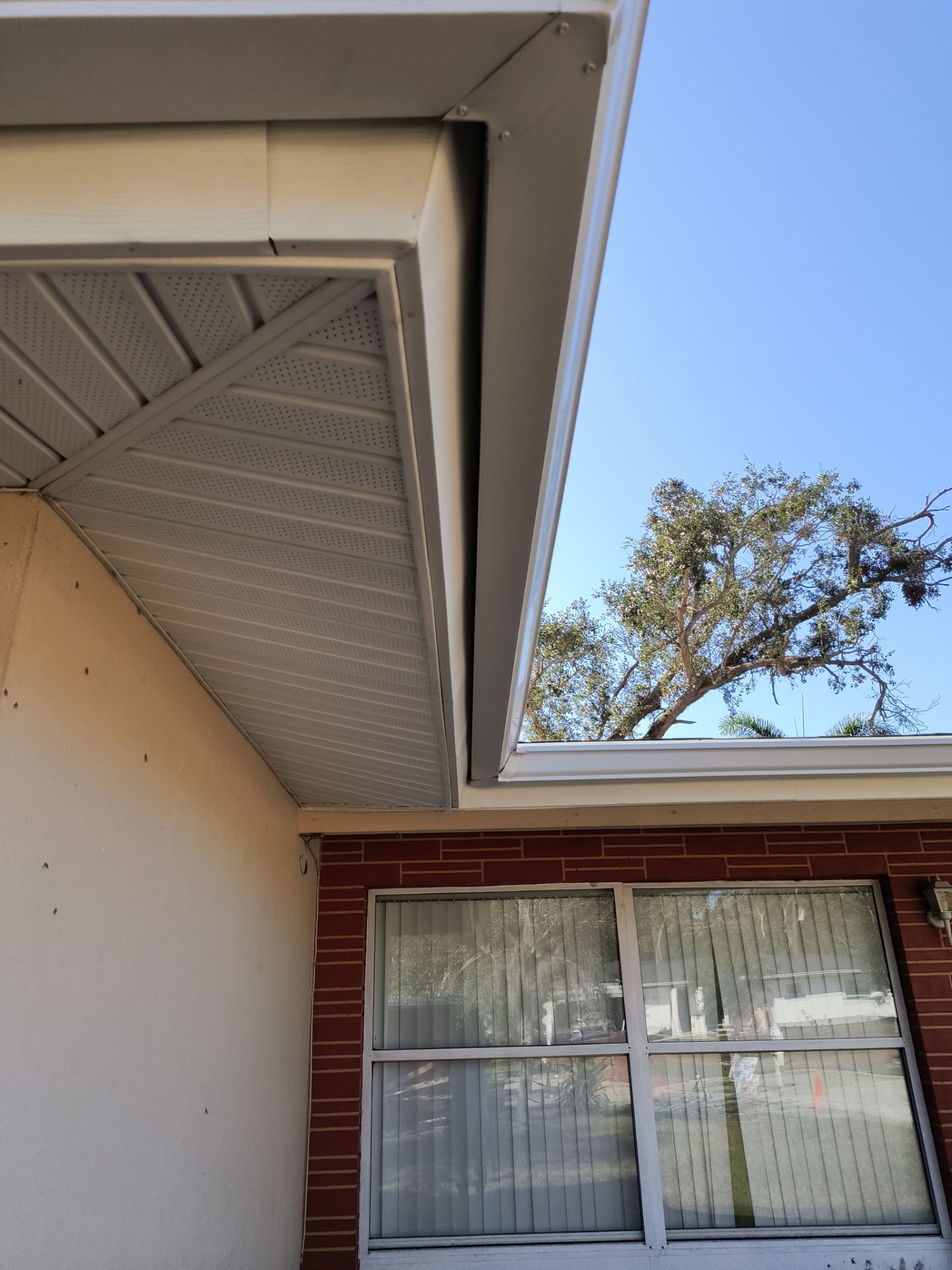 White Soffit and Fascia Upgrade in Sarasota FL by Gutter Professors