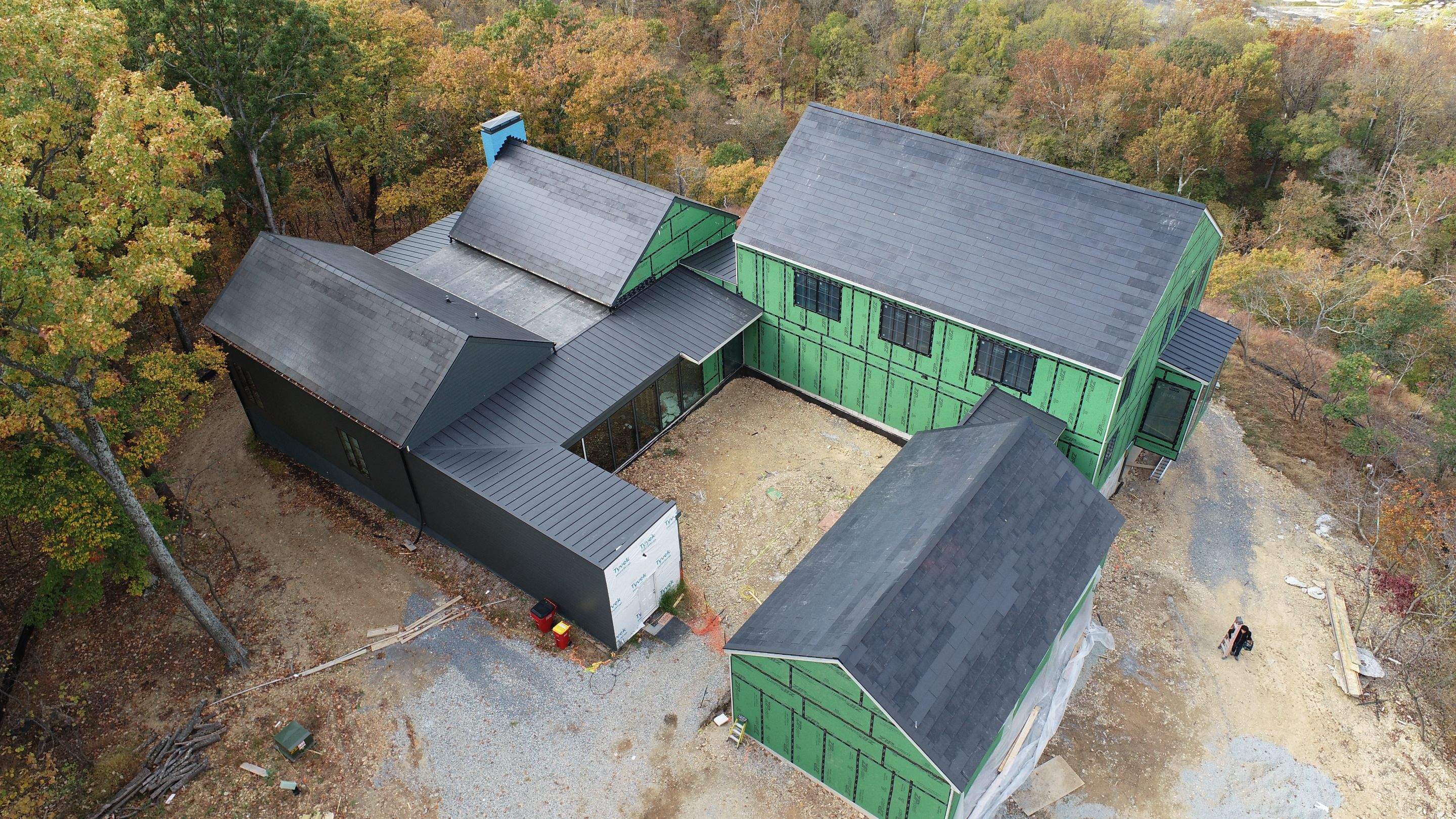 Roof Installation using Tesla Solar Roof V3 by American Home Contractors