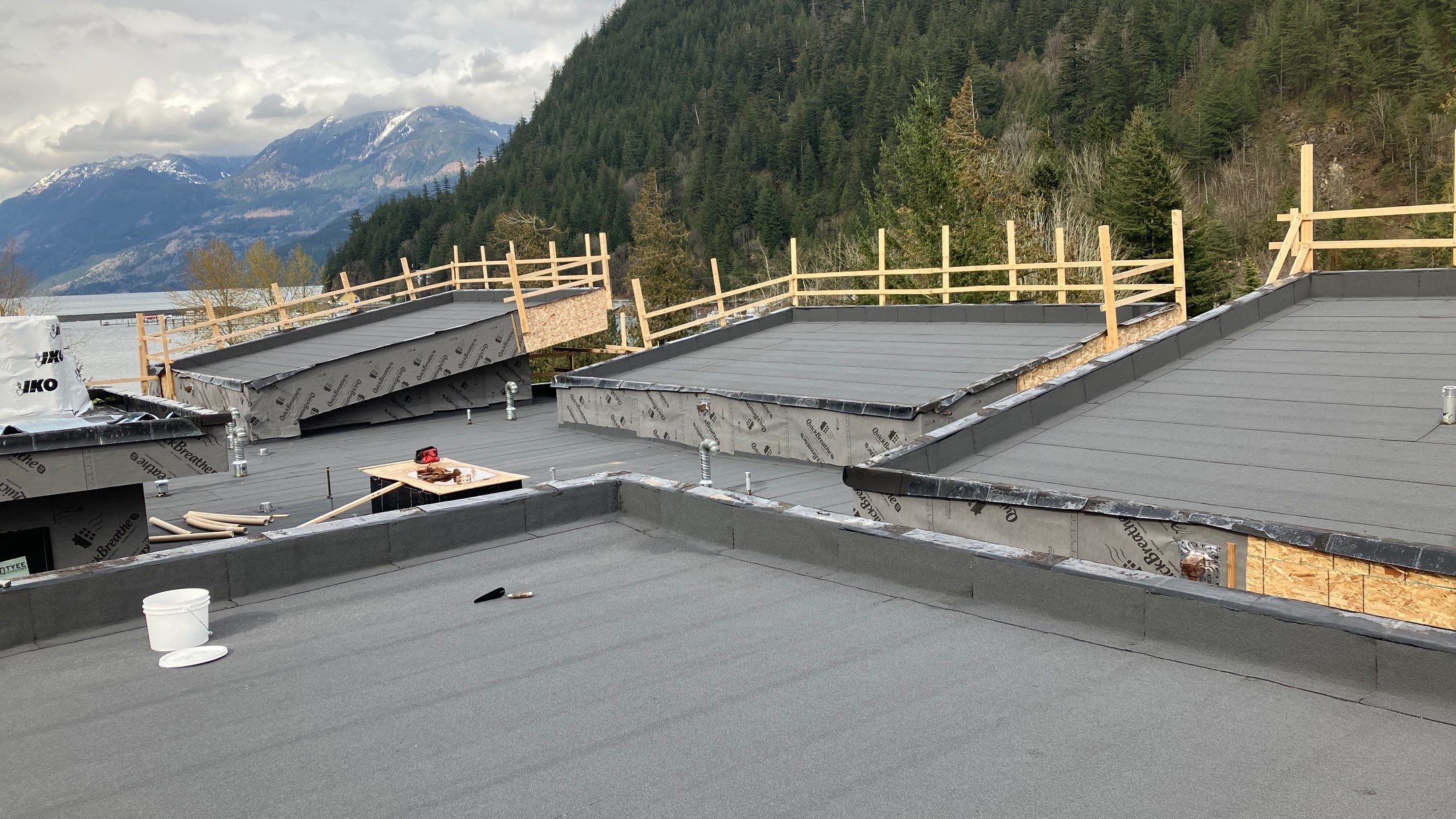 Commercial Roofing Installation using IKO 2ply sbs  by Top Notch Roofing Inc