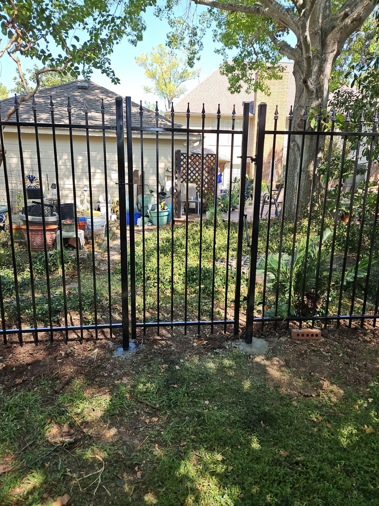 Iron fence installation using LION iron panel - 2 Rail, 6ft Tall by Tim's Fences