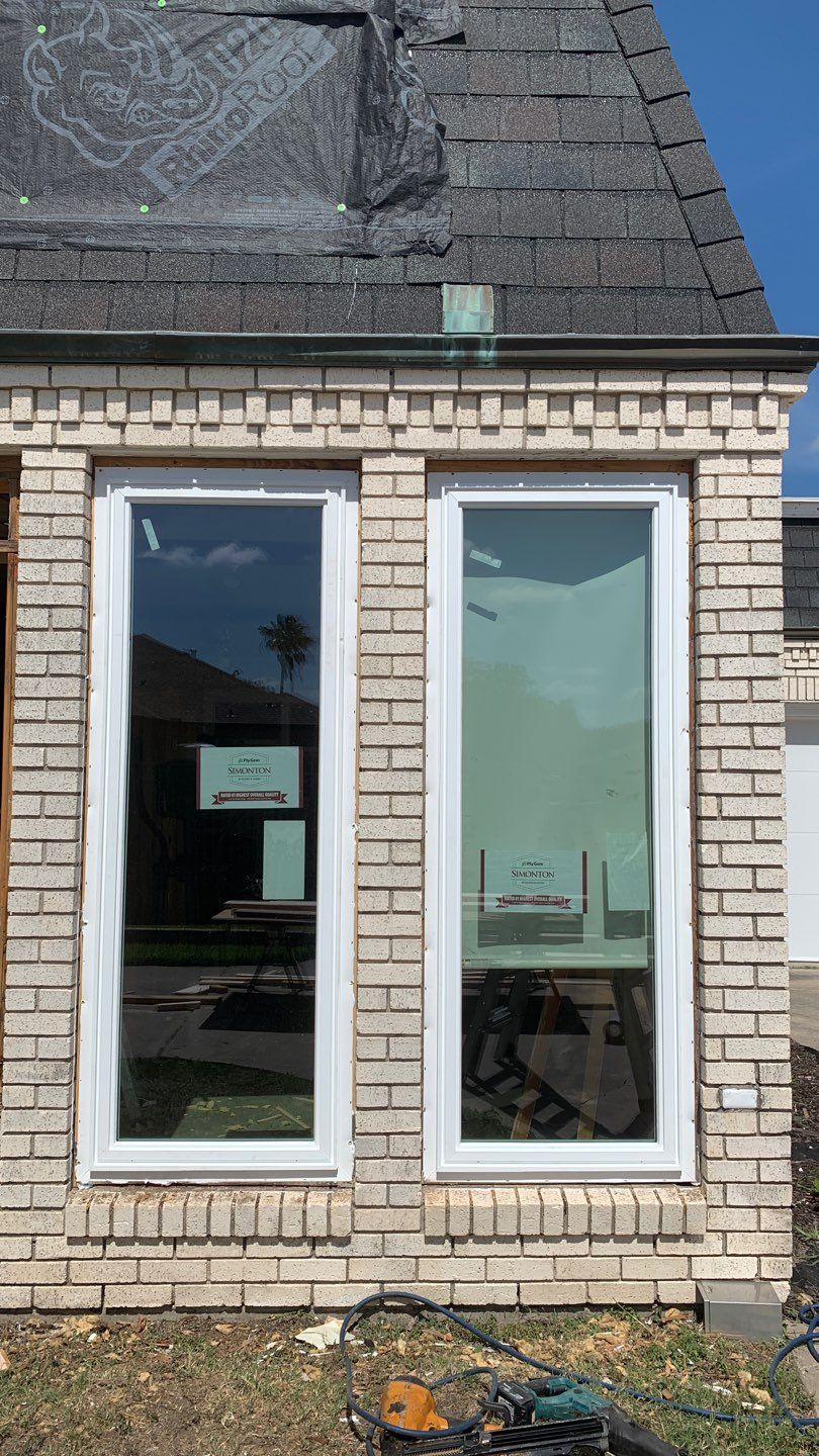 Mansard Charm by Bayfront Roofing and Construction